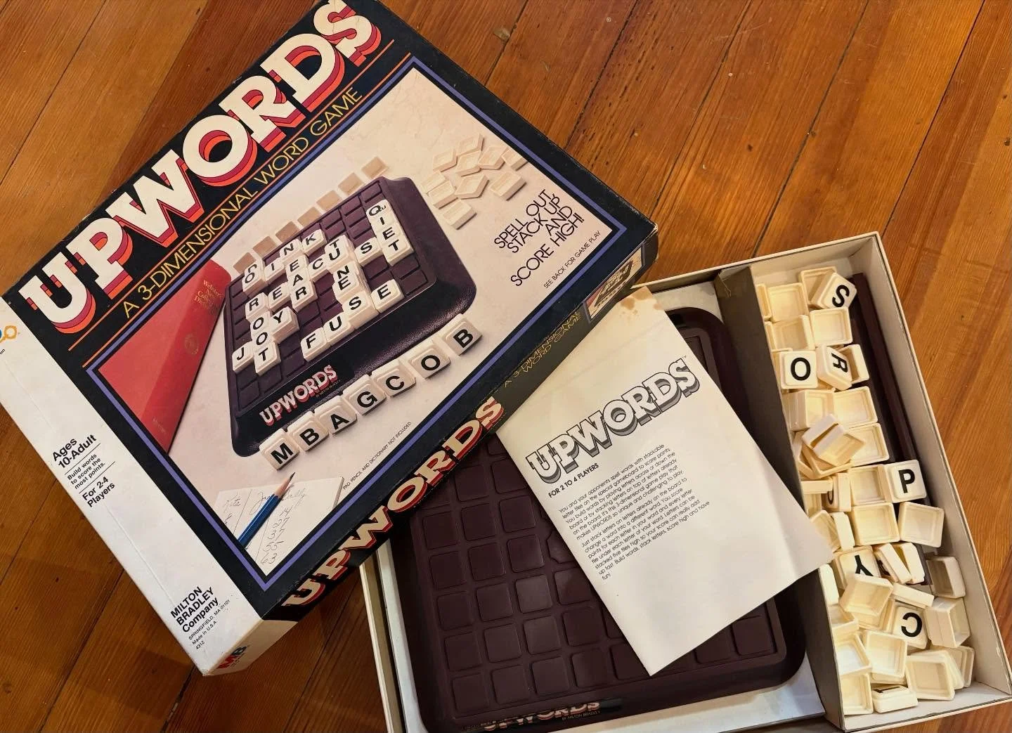 #1983 #upwords game! Has all tiles and instructions; has two original racks and is missing two.  You could substitute Scrabble racks or anything else to obscure tiles during play with 3 or 4 people. $15