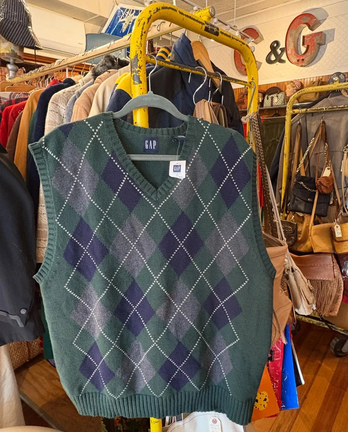 Adding two super nice and holiday-perfect sweater vests to the shop today!  First is deadstock, likely #1990s all cotton Gap argyle in blue, green, gray and white.  It's an XXL; NWT. The second is a circa 1960's or 1970's Scottish Intarsia Cashmere p