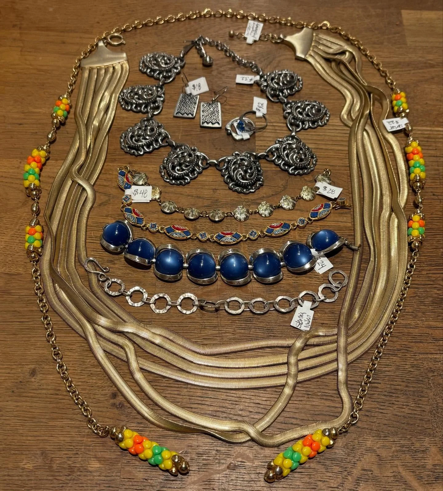 Eclectic jewel flat lay; all hit the selling floor today!
