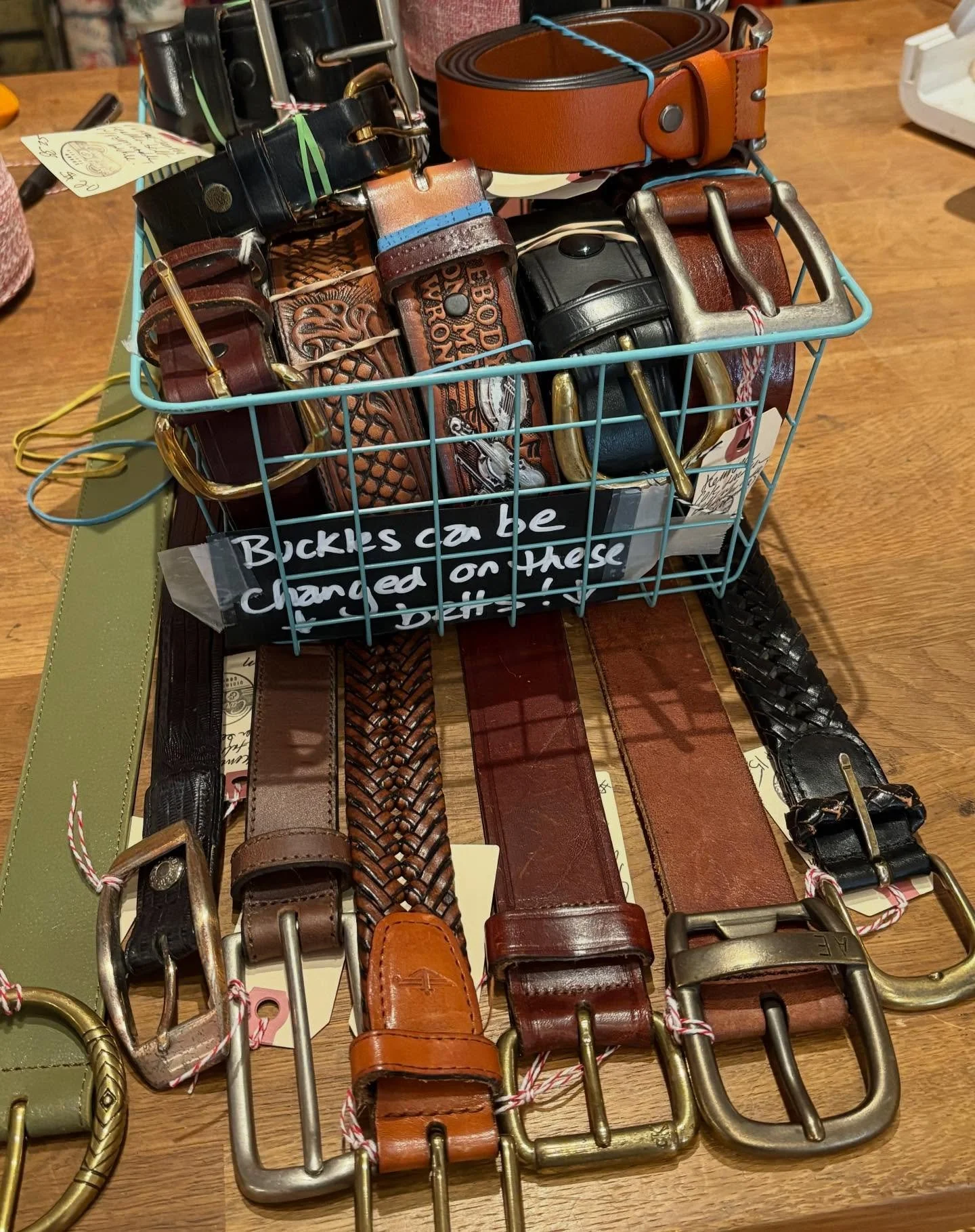 Added SO MANY belts today! A number of these were smaller - 32,34, 38 - size belts on which you can change the buckles. Because of space, these are in the case with the buckles through the holiday season.