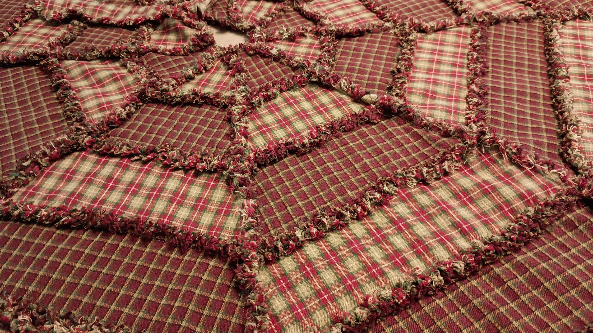 An octagon rag quilt Christmas tree skirt