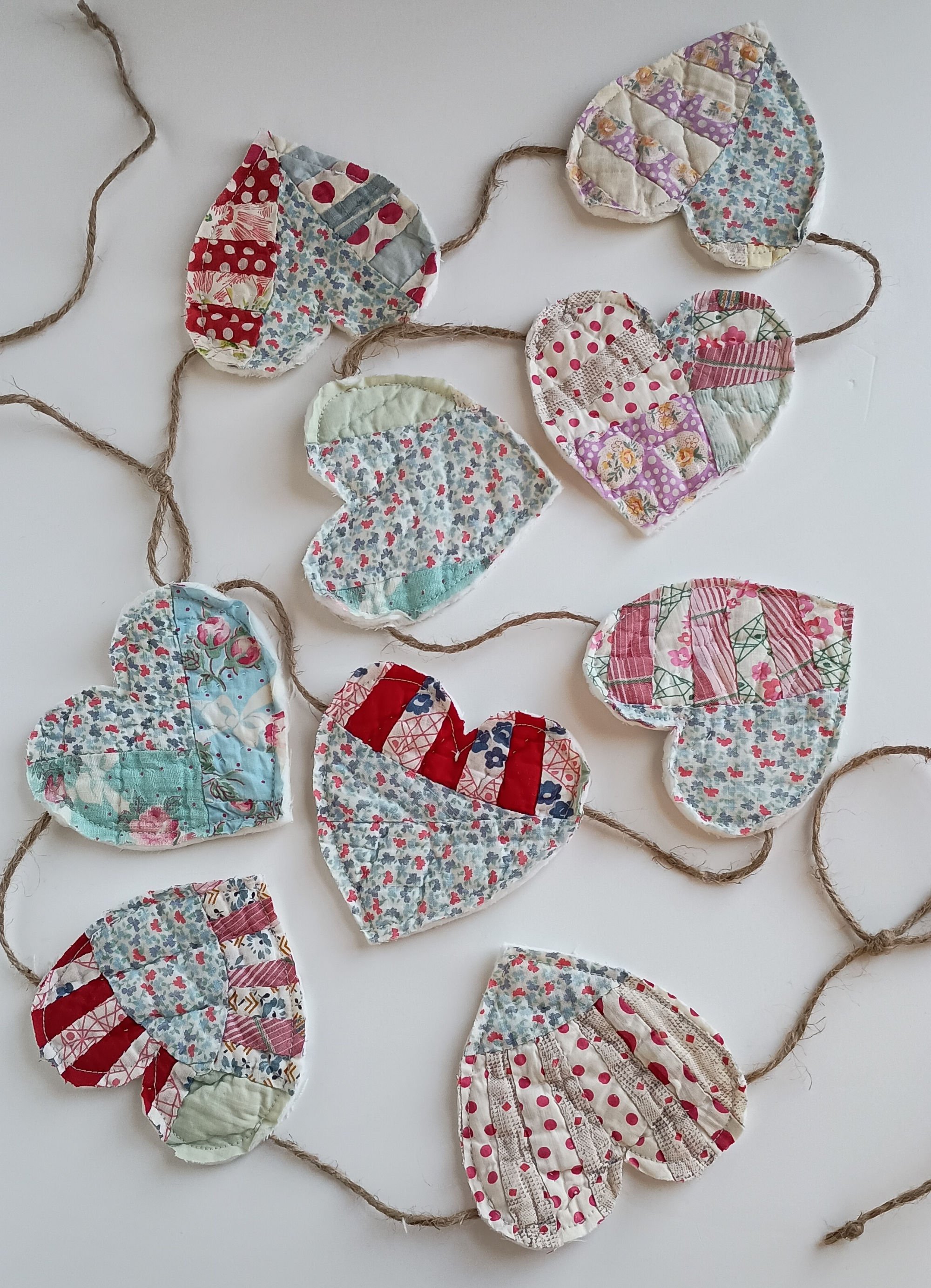 A garland made of jute rope and hearts cut from an antique quilt