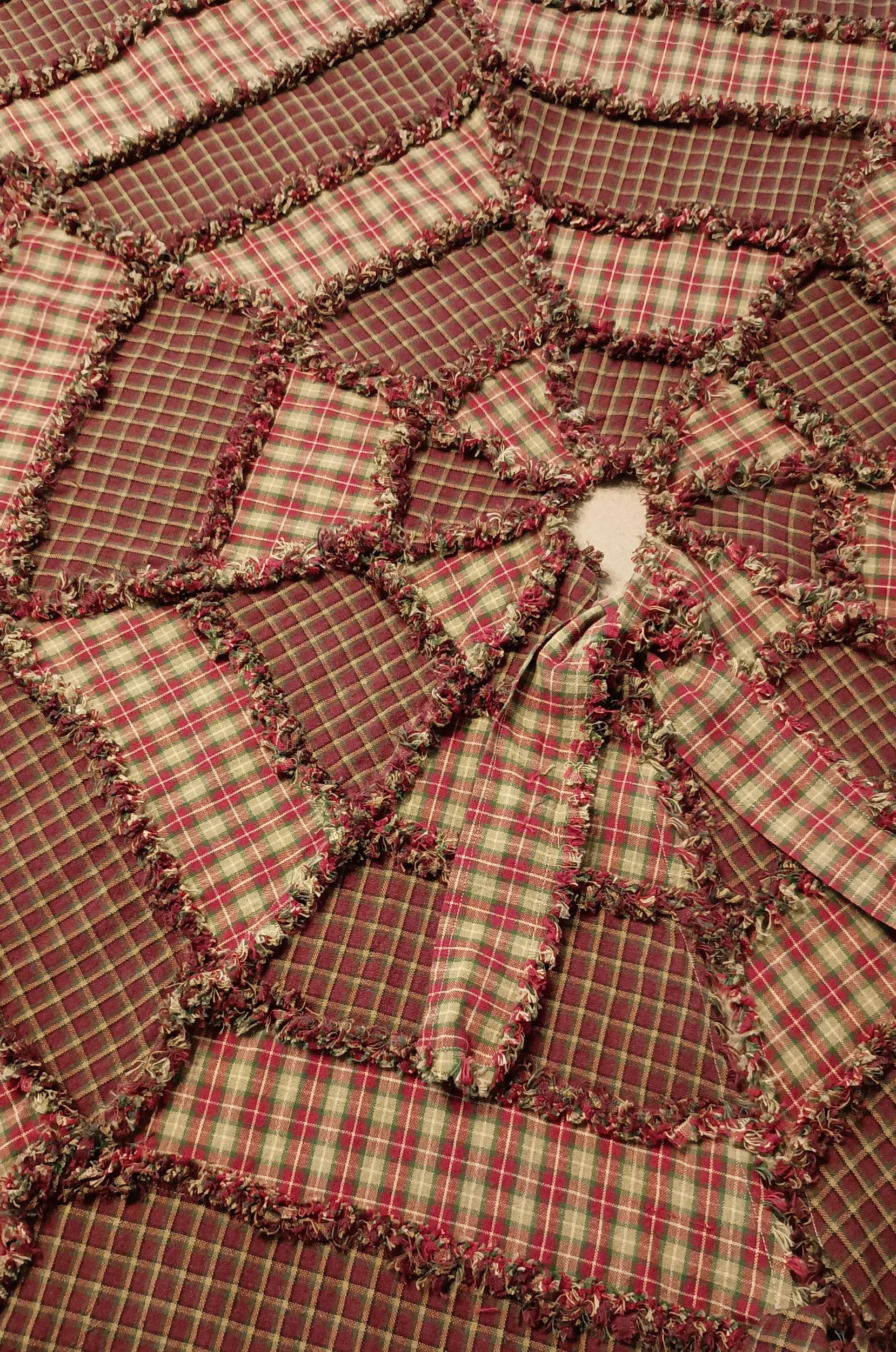 An octagon rag quilt Christmas tree skirt
