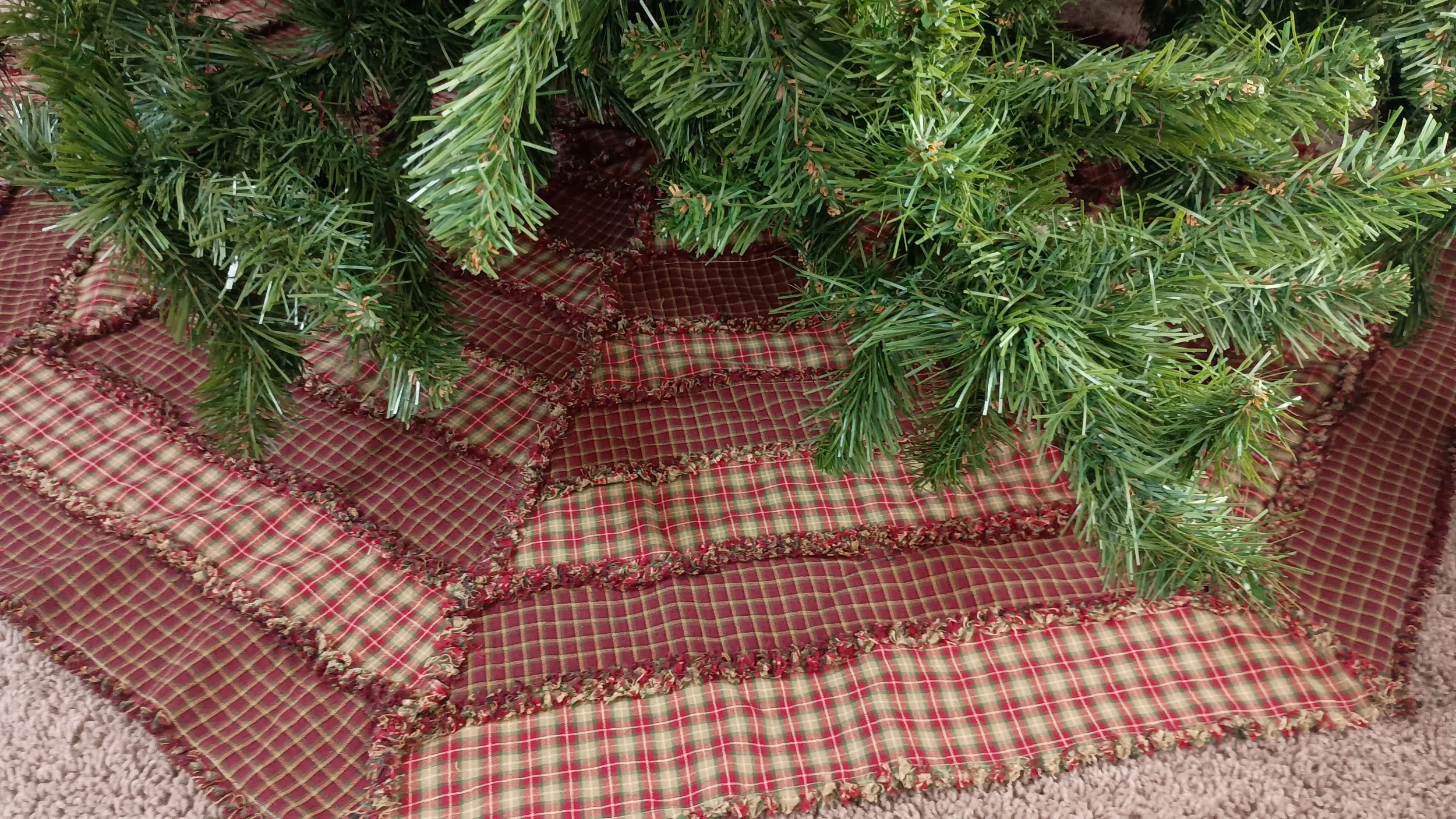 An octagon rag quilt Christmas tree skirt