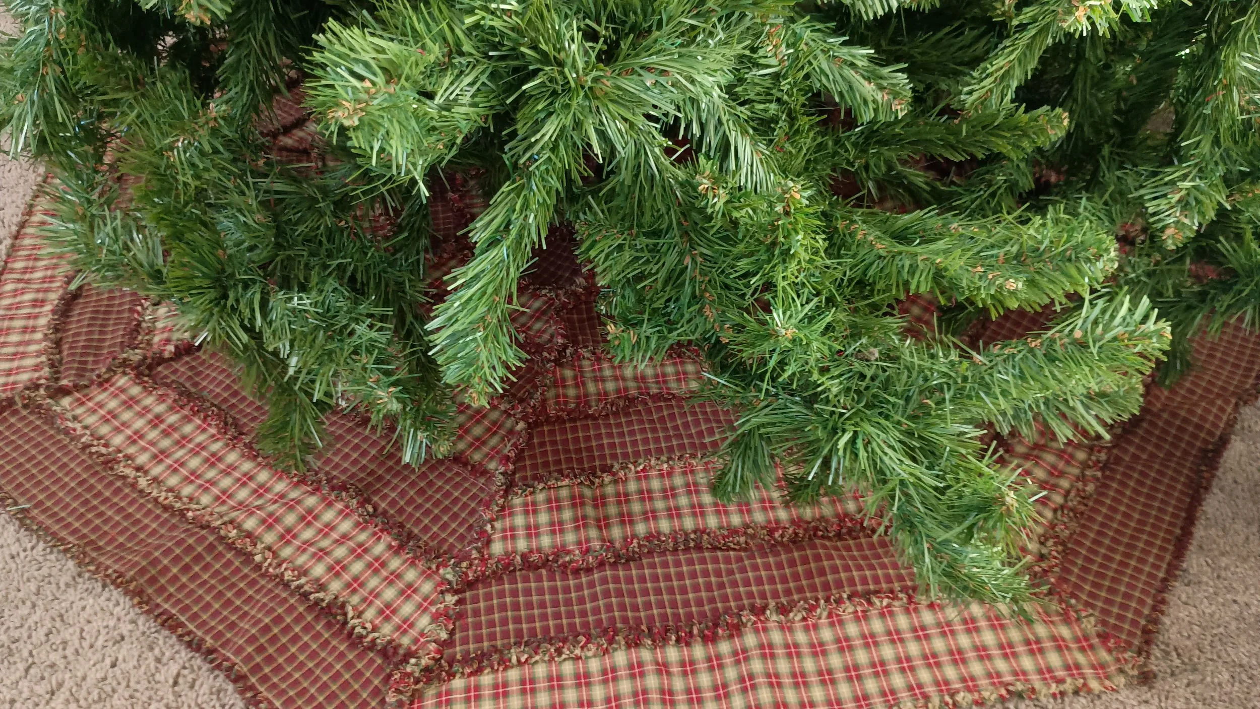 An octagon rag quilt Christmas tree skirt
