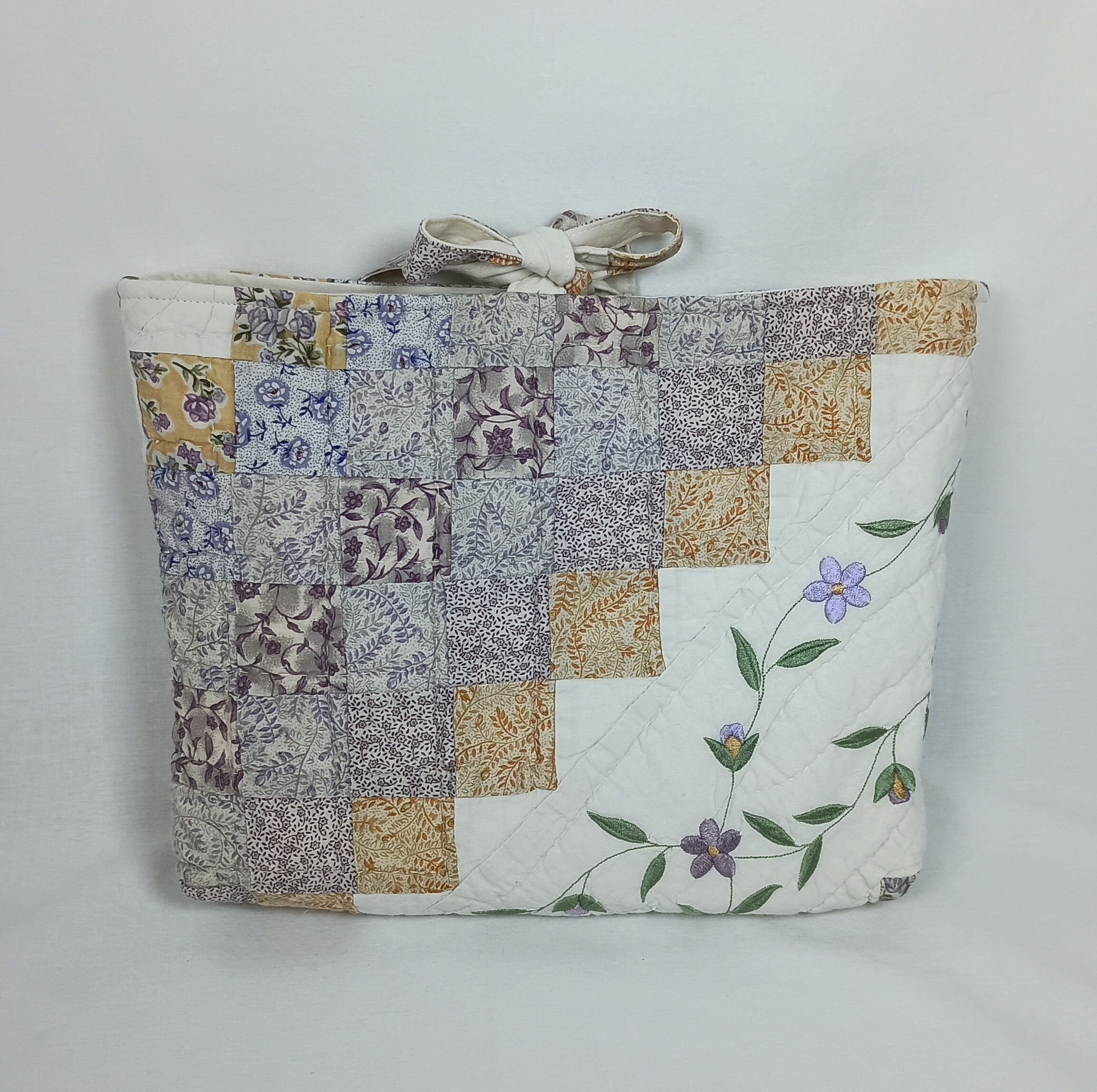 The back of an extra large Bible sleeve with Lavender Floral Embroidery made from a vintage quilt
