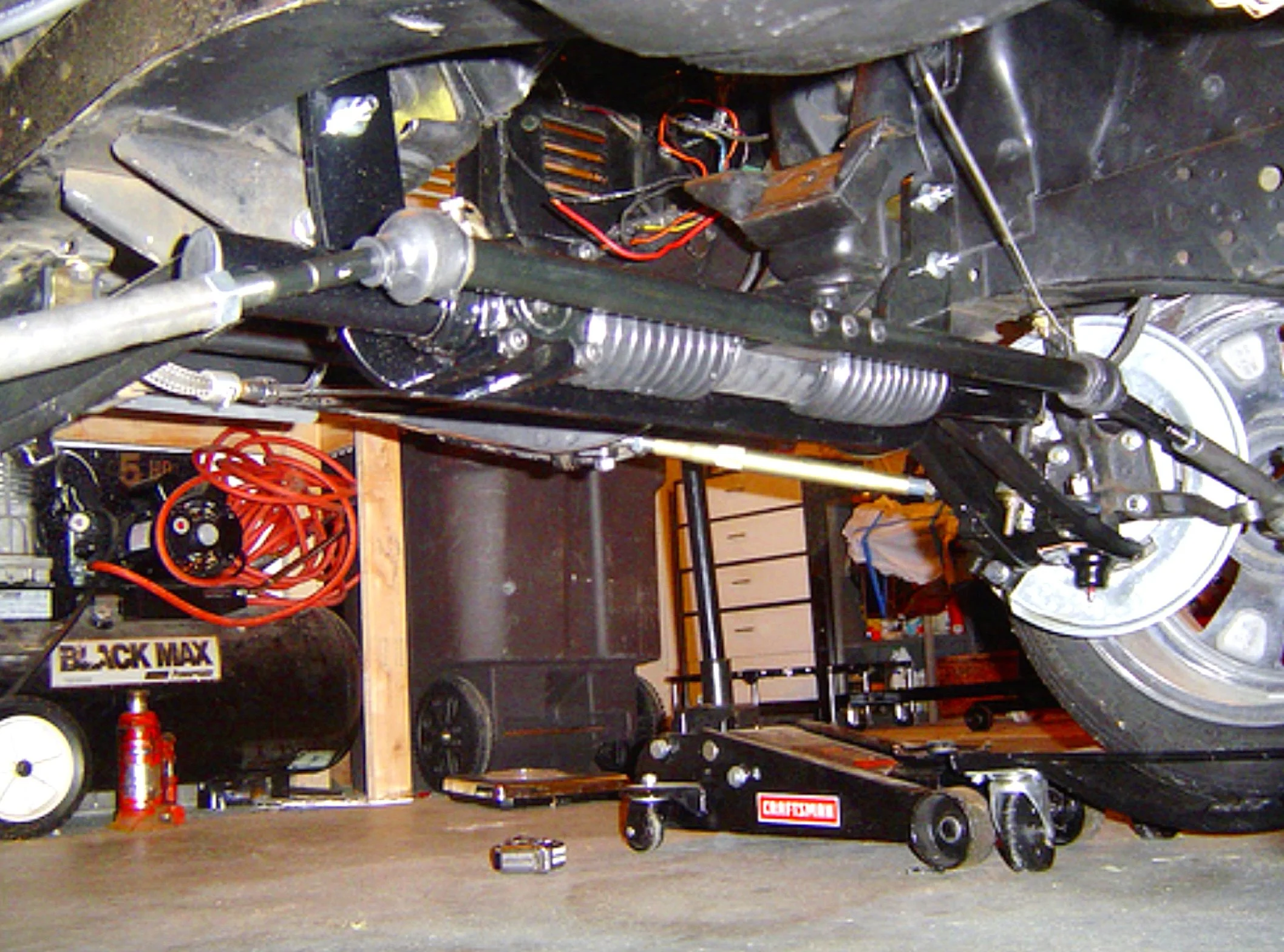 the location of s power steering rack in the car