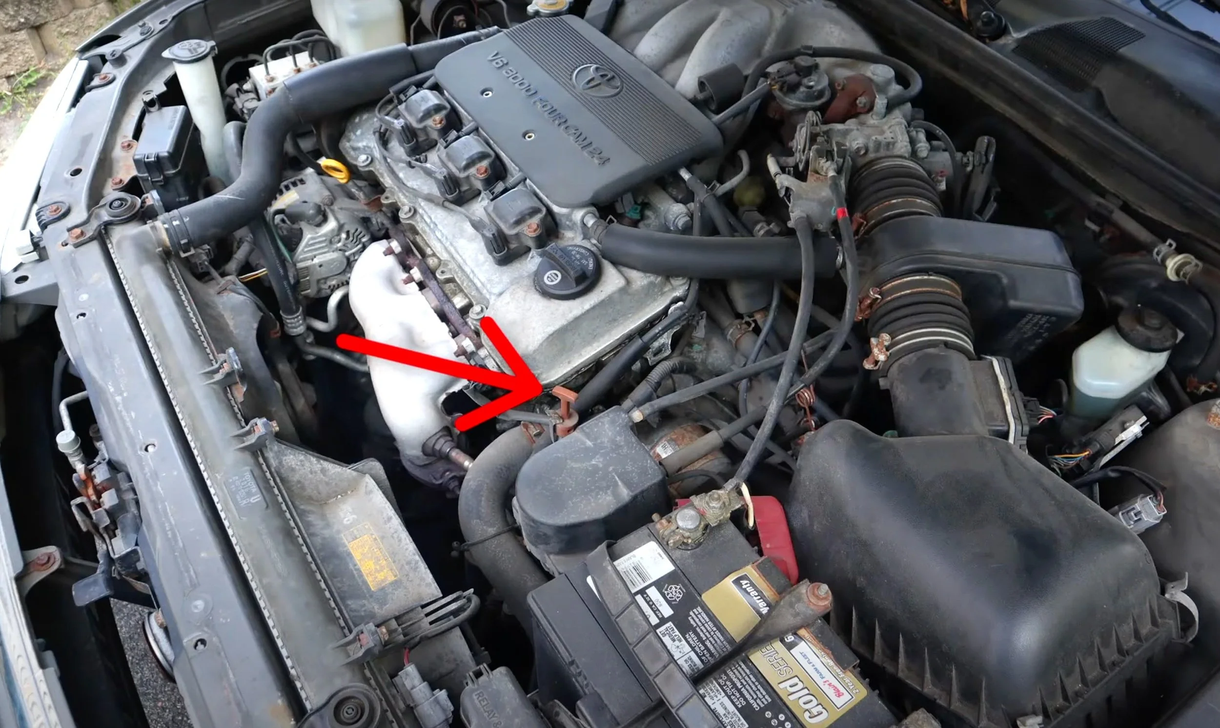 location of the transmission fluid level dipstick in a vehicle