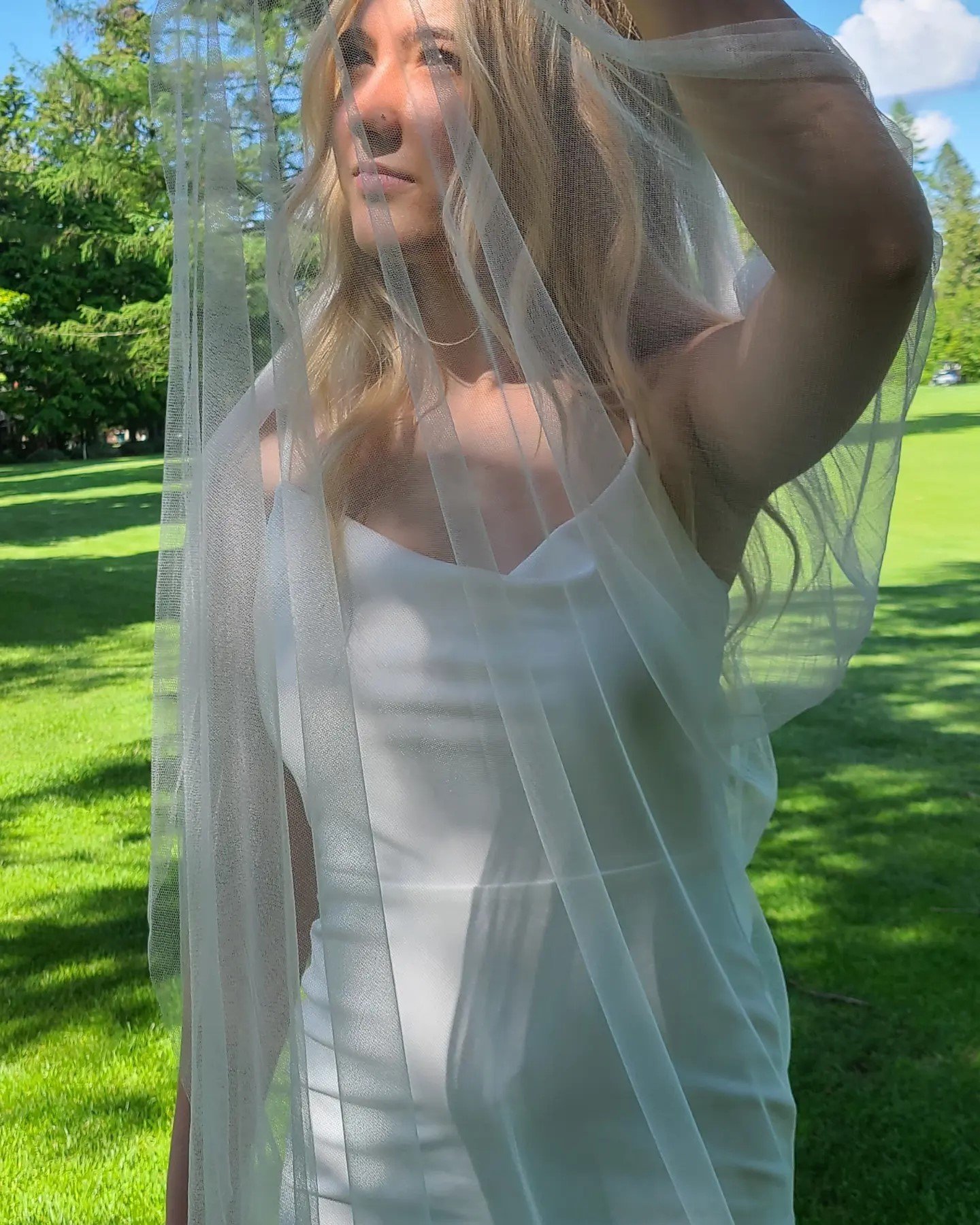 Erica veil peering through.jpeg