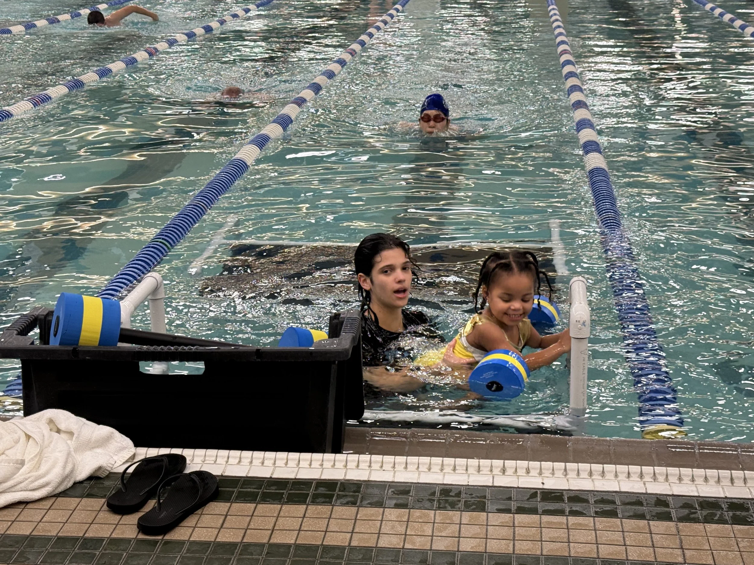 Kids at their swimming lessons