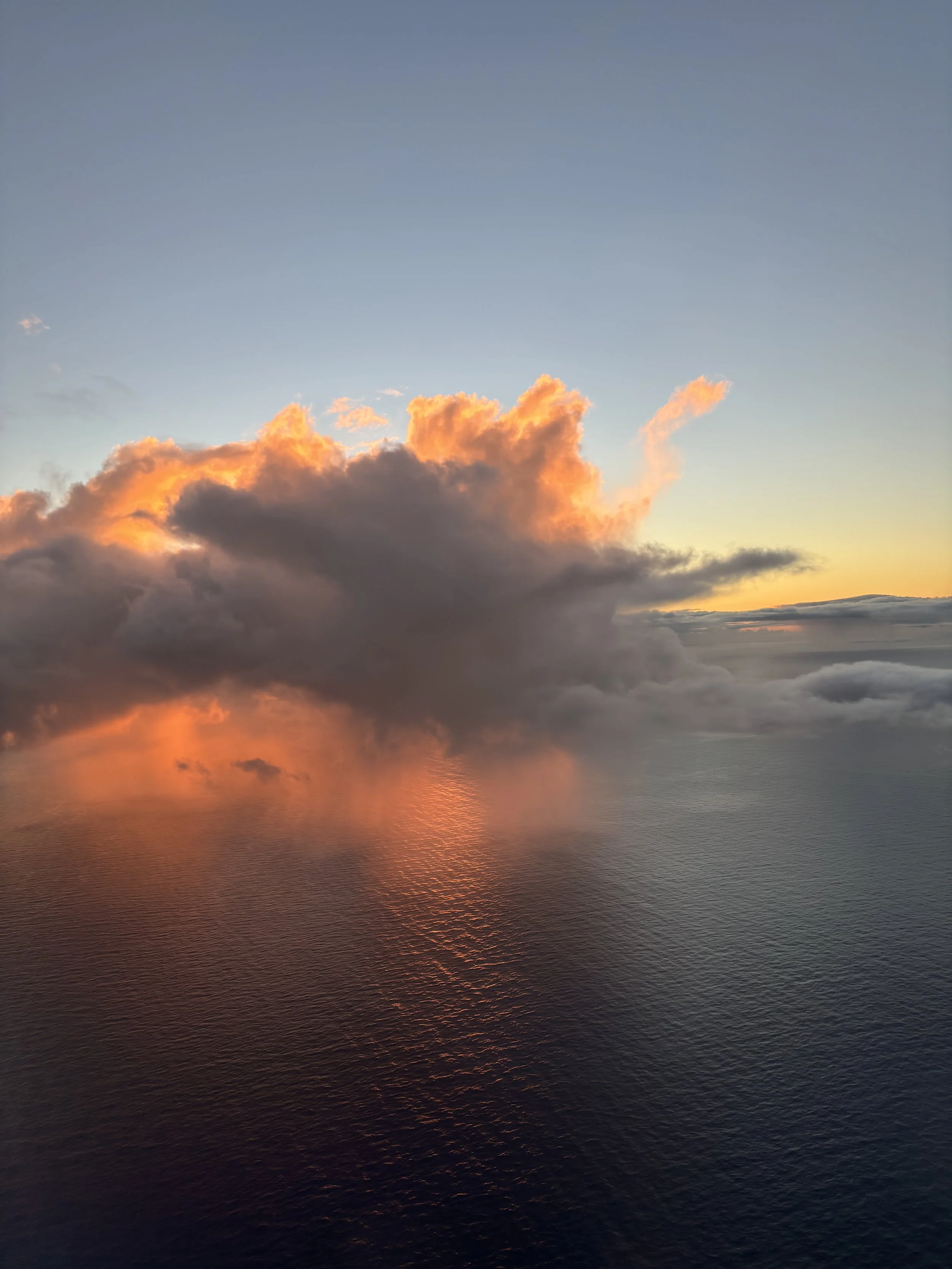 rain falling at sunset - view from the heavens