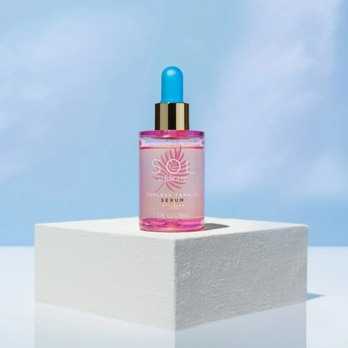Jergens Sunless Tanning Serum on pedestal
