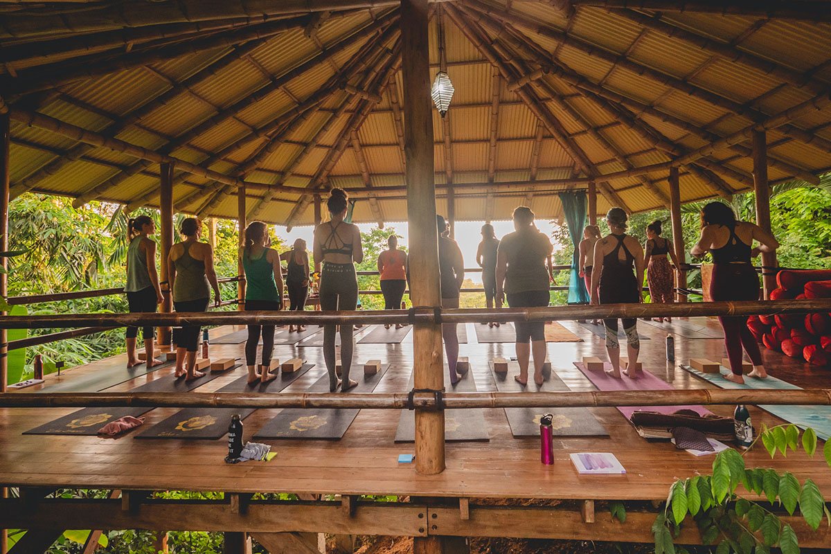 Group of people doing yoga at Selva Armonia