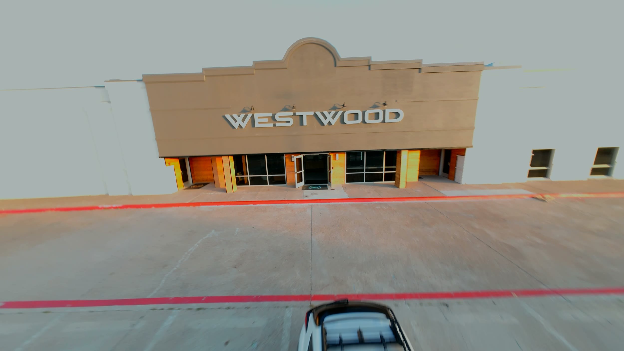 The Westwood storefront and front doors seen from the parking lot
