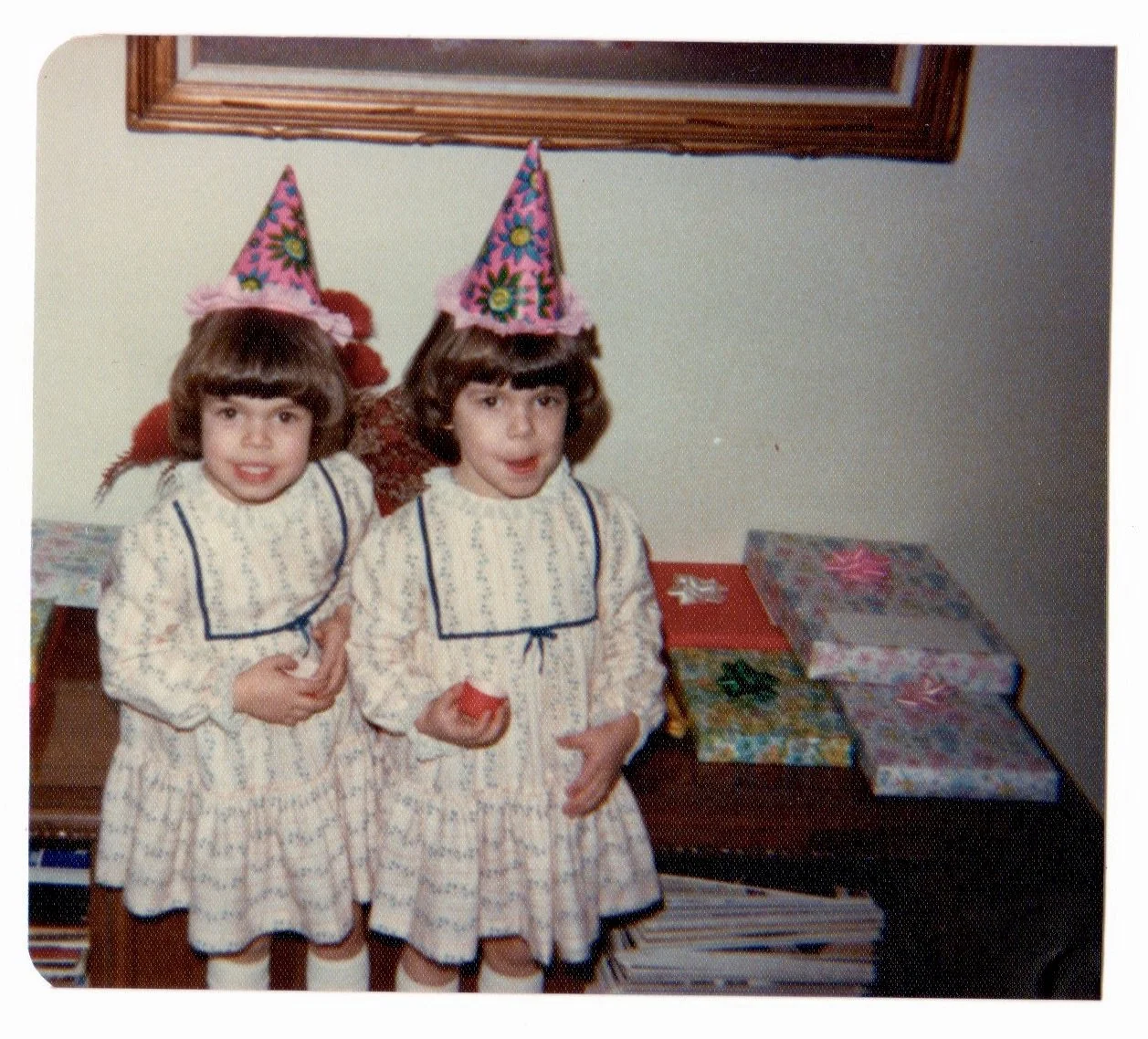 With identical twin sister on 5th birthday