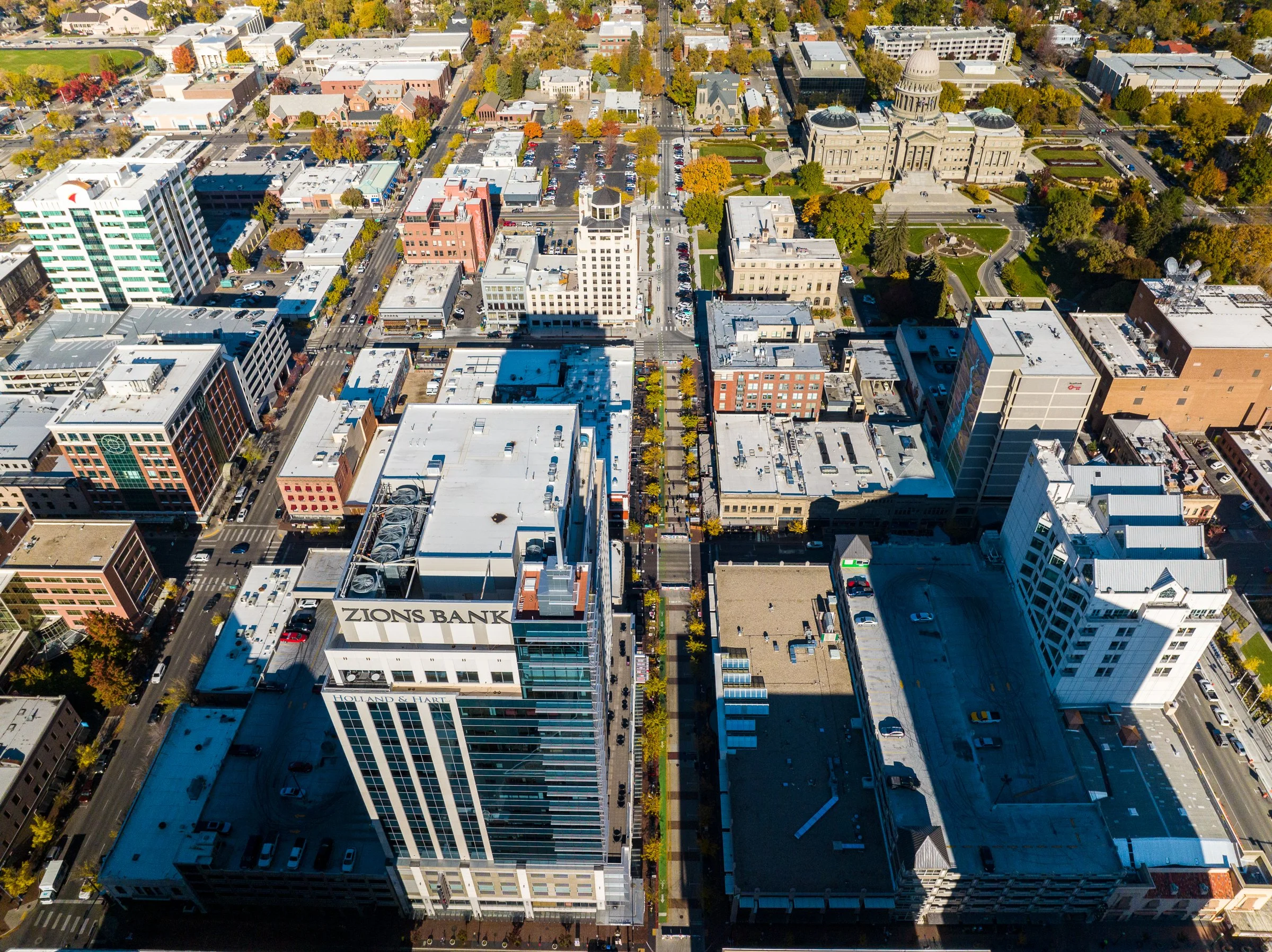 Top-down aerial drone photo of downtown Boise, Idaho, showing city blocks and architecture from above.