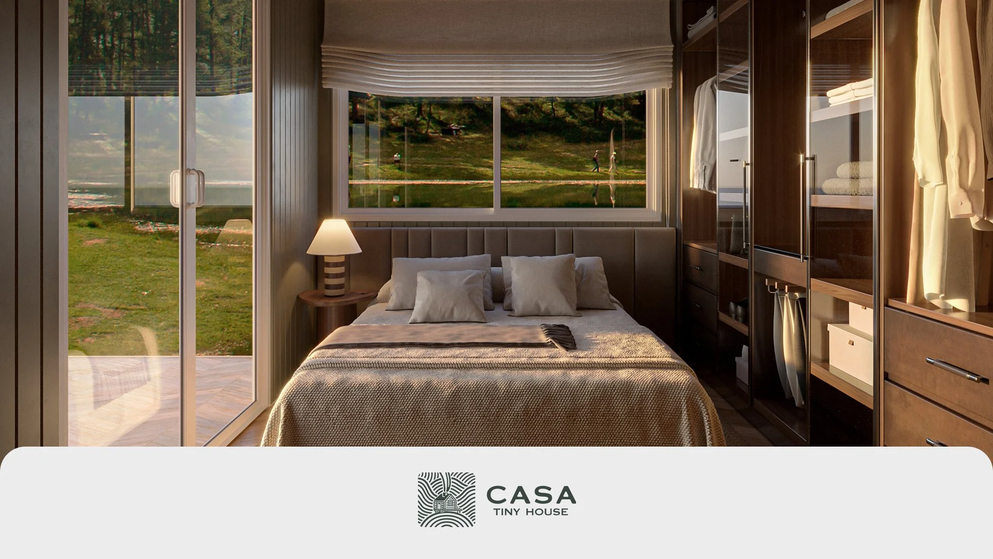 Bedroom inside a Casa Tiny House tiny home, with sliding glass doors, a full size bed and built in wardrobe