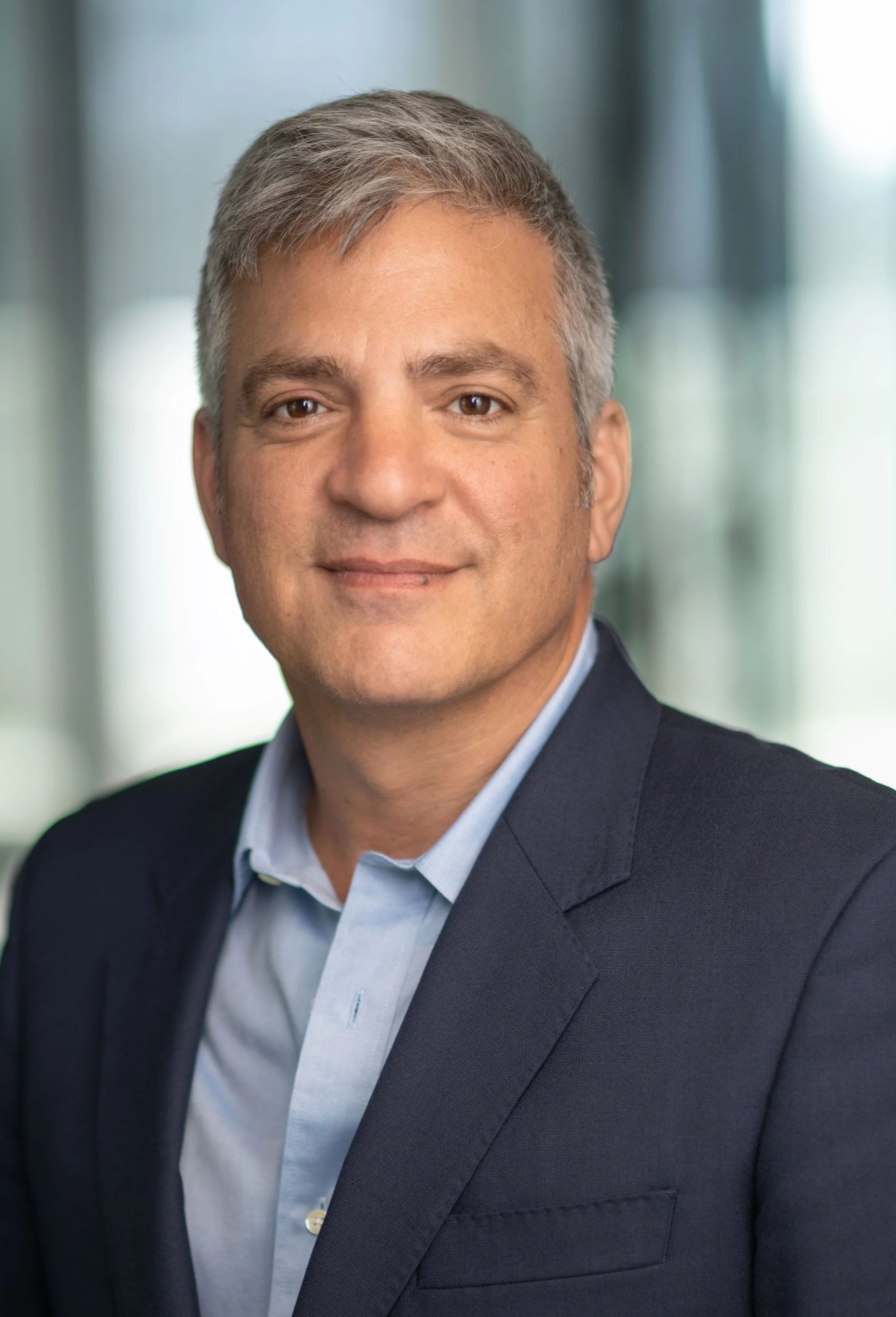 Peter Edwards  0 a Man with grey hair and brown eyes