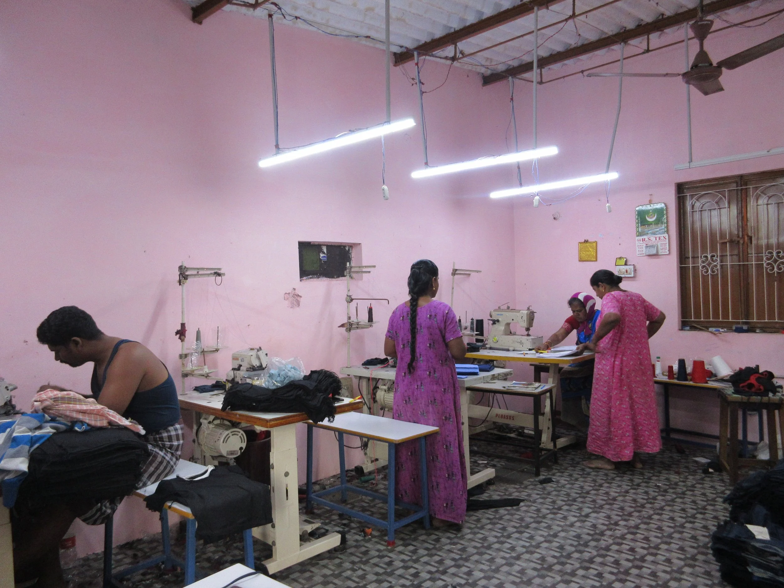 “This is a room in someone else’s house, close by to my home. I don’t work there myself, I work from my own home. The woman in pink is the helper, who had made a mistake – she’d placed the material back on back so it was unable. In this image, she’s 