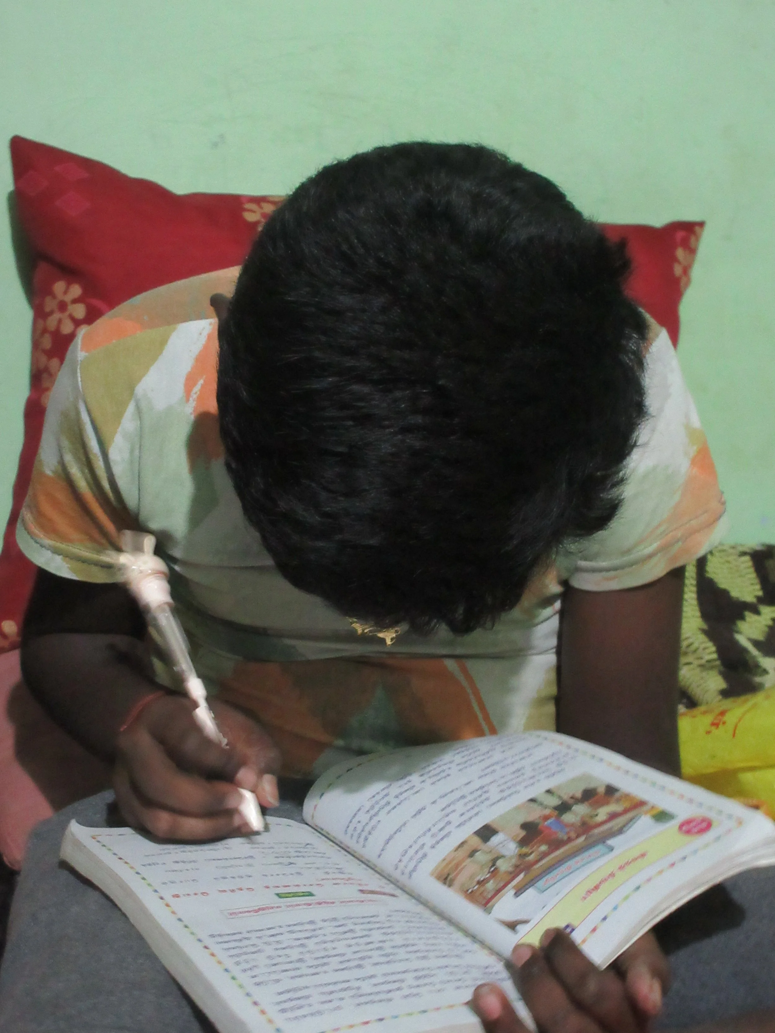 “This is my grandson, studying to the 5th Standard. His name is Vishwa and he’s 11. He wants to be a doctor when he grows up. My son and his wife come to visit me, they live nearby, but my grandson lives with me and goes to school nearby. I take good