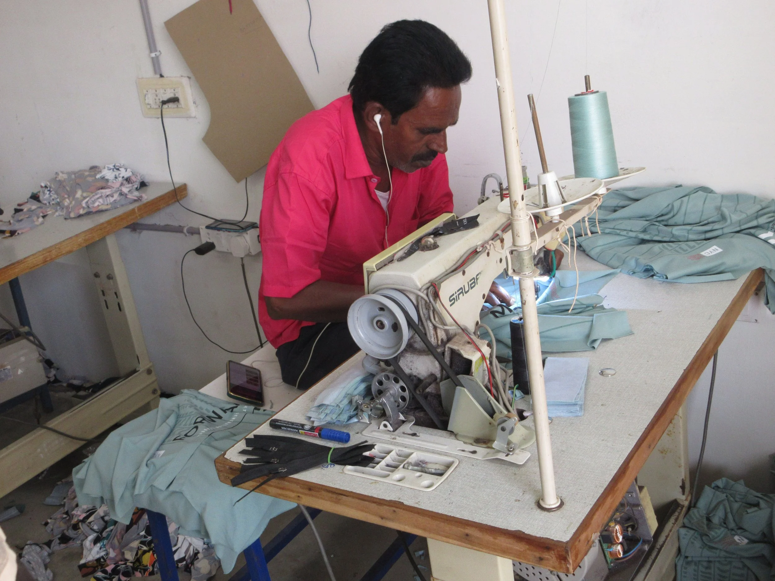 “He’s wearing headphones, which is not allowed in a factory. Even in homebased work, it’s not really allowed – only if you are doing it in your own home. In a small family company outside the home, you have people to talk with, and constantly things 