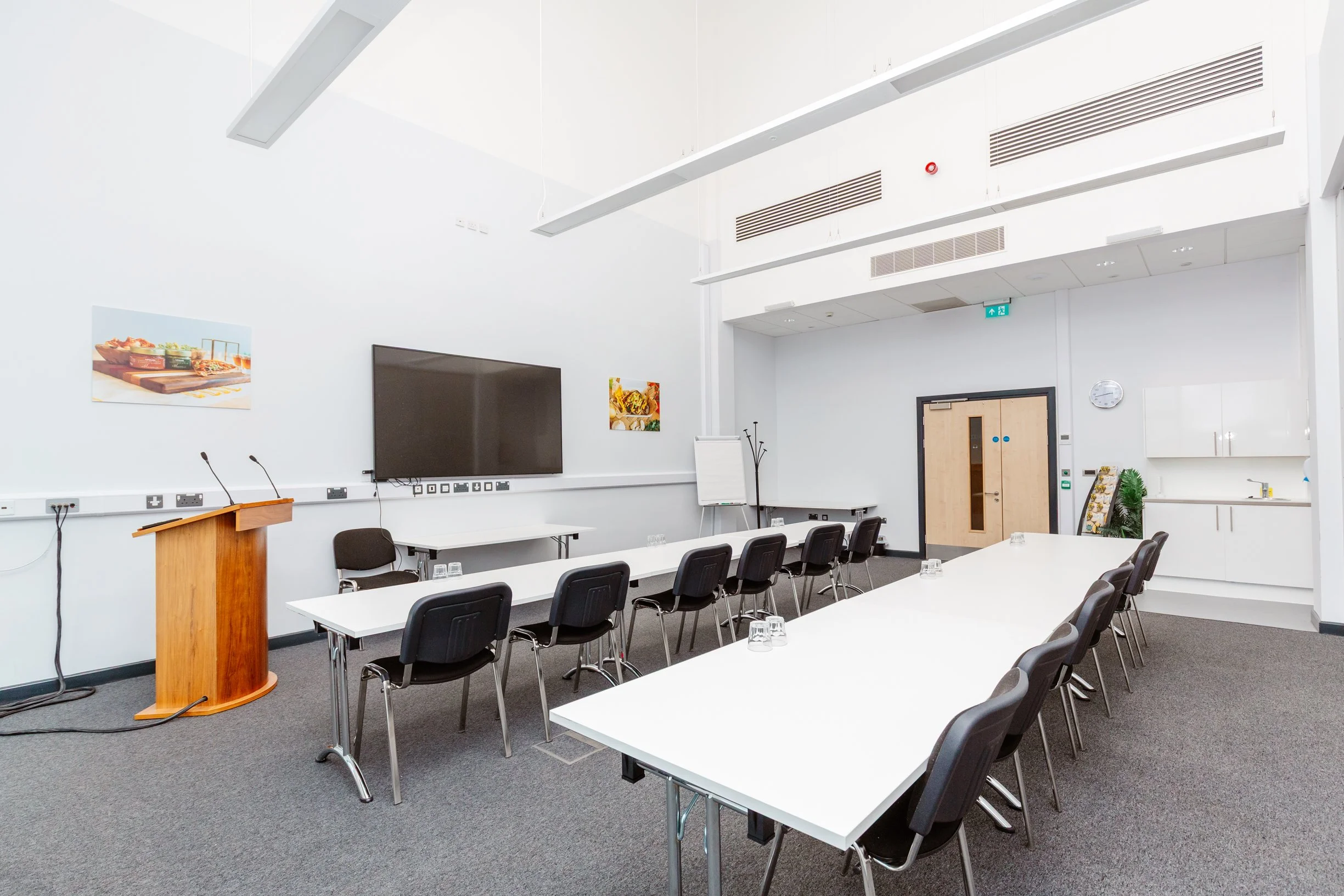 Meeting room with tables and chairs