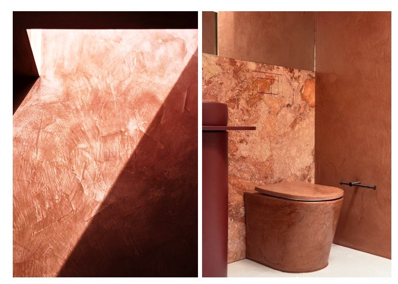 Bathroom with Venetian plaster walls in rich earthy tones, paired with modern fixtures and natural stone.