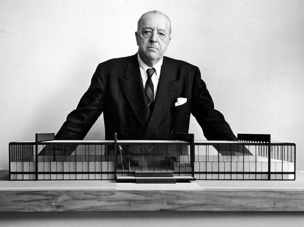 Mies van der Rohe with architectural model — modernist design and structural clarity.