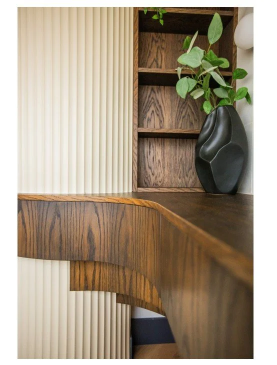 “Curved desk and ribbed panelling in Shelford Cambridge interior design project.