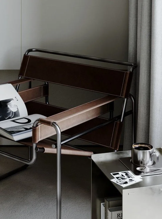 Wassily Chair by Marcel Breuer in a minimalist interior with tubular steel frame and leather straps