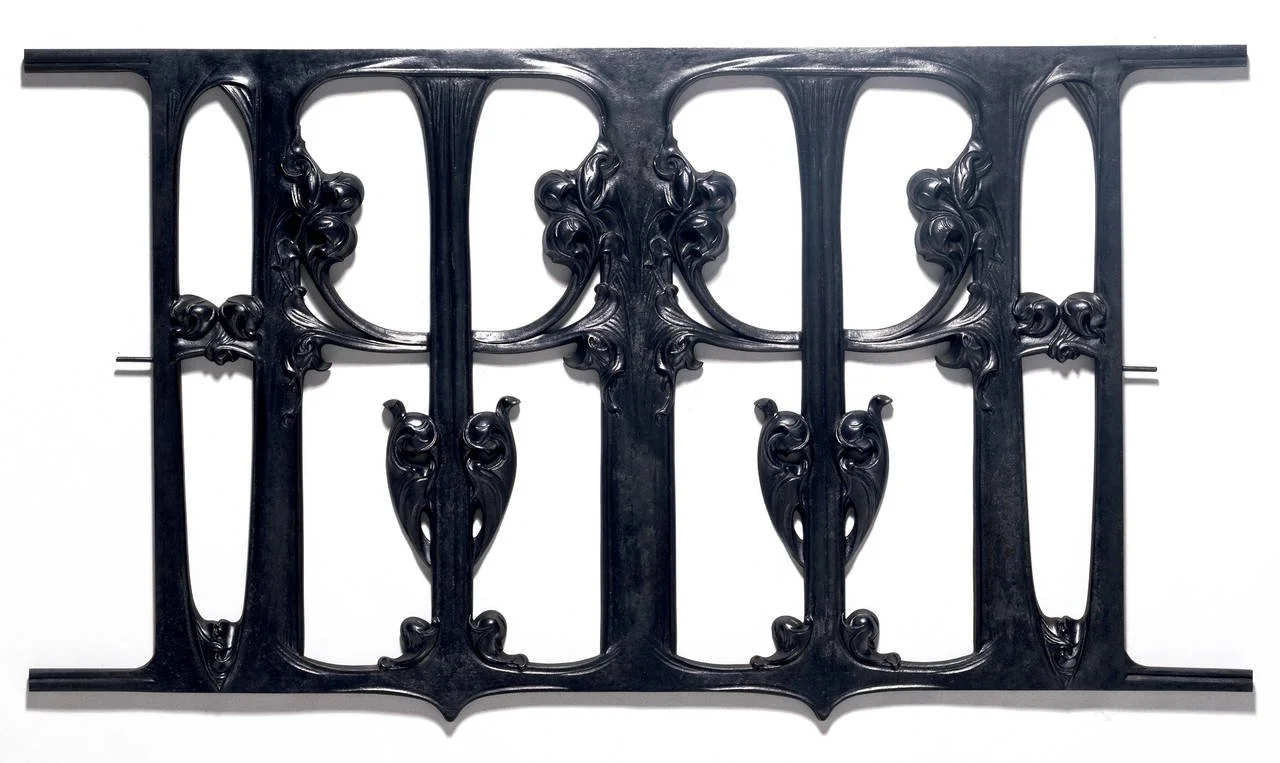 Art Nouveau balcony front by Hector Guimard, France, c.1900 — ornate ironwork with whiplash curves and botanical motifs. Victoria and Albert Museum collection.
