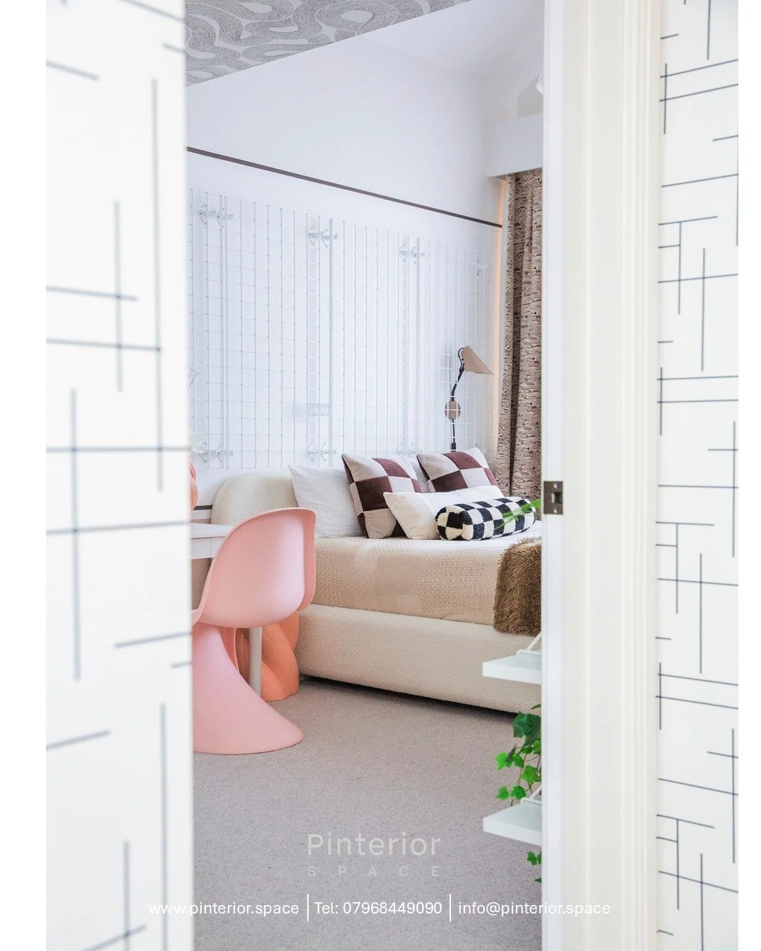 View through a doorway into a calm, contemporary family room designed around everyday living.
