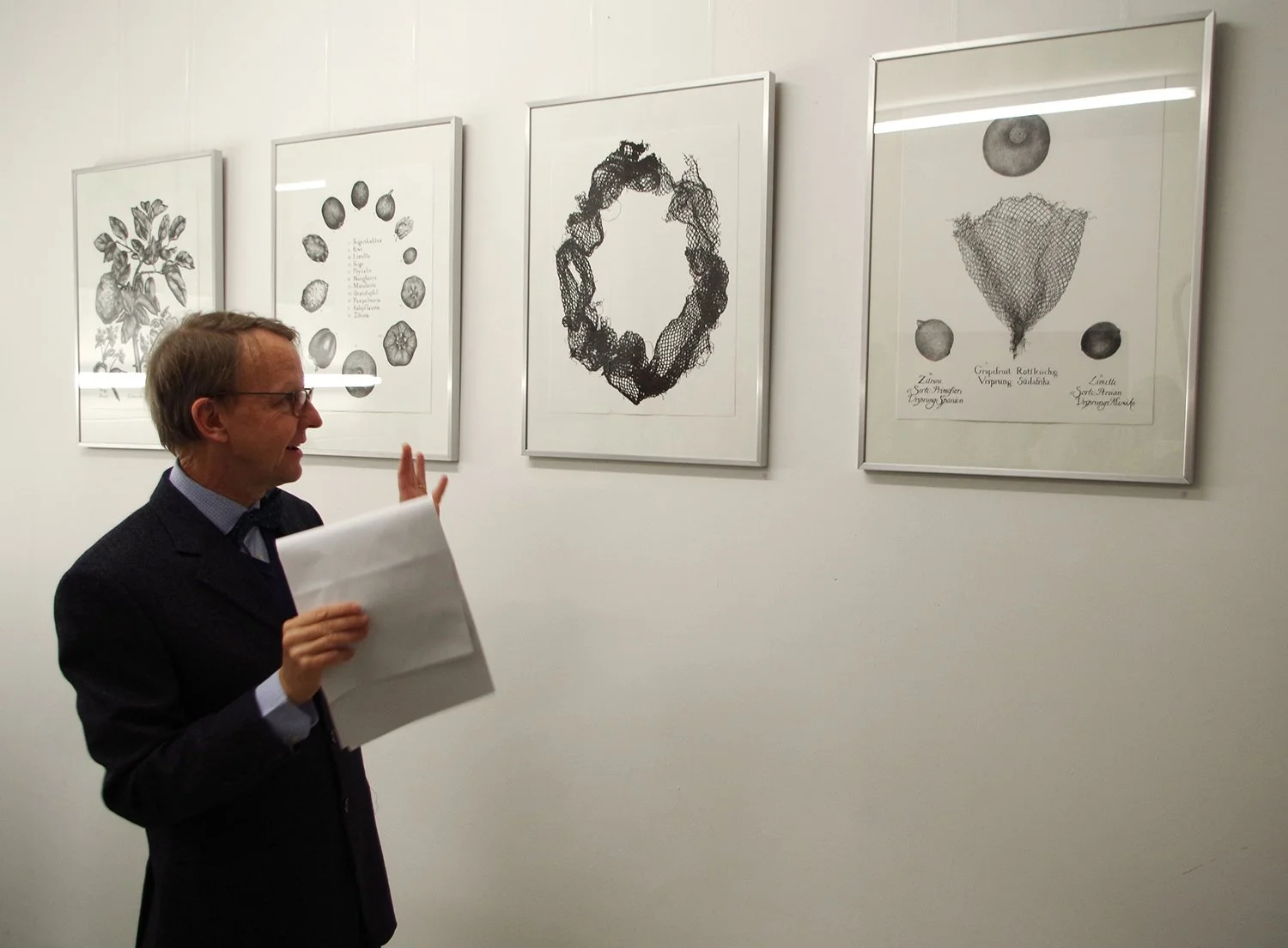  Art historian Gernot Lorenz discussing the work at the opening of the exhibition. 