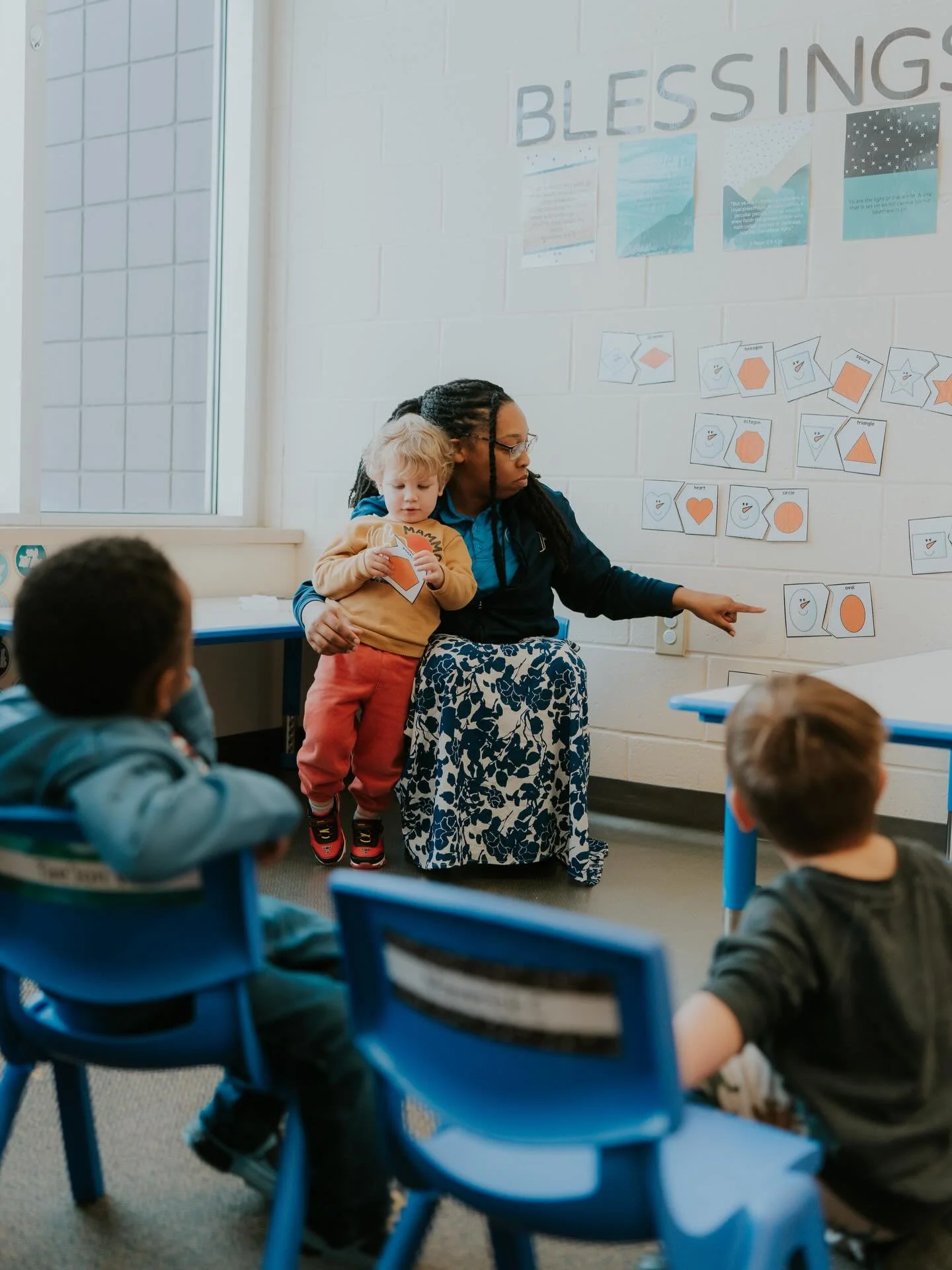 Having fun with a shape matching activity in our two-year-old room! 🤩