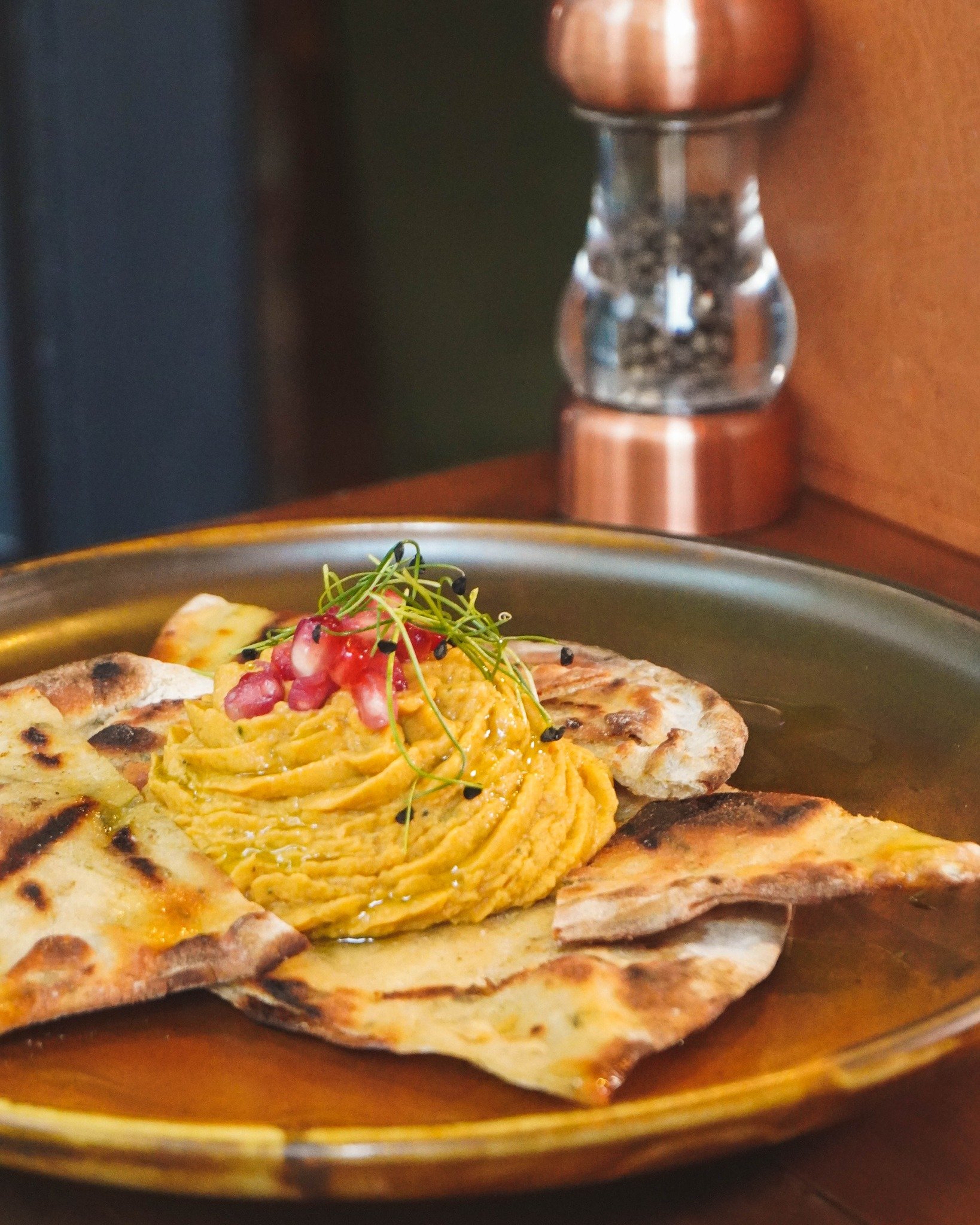After a light bite? 🤔

Indulge in a delicately spiced hummus, served with a homemade flatbread, drizzled with coriander oil and sprinkled with pomegranate. Pairs perfectly with a glass of dry white wine 👌

Book your table now via the link in bio 🔗