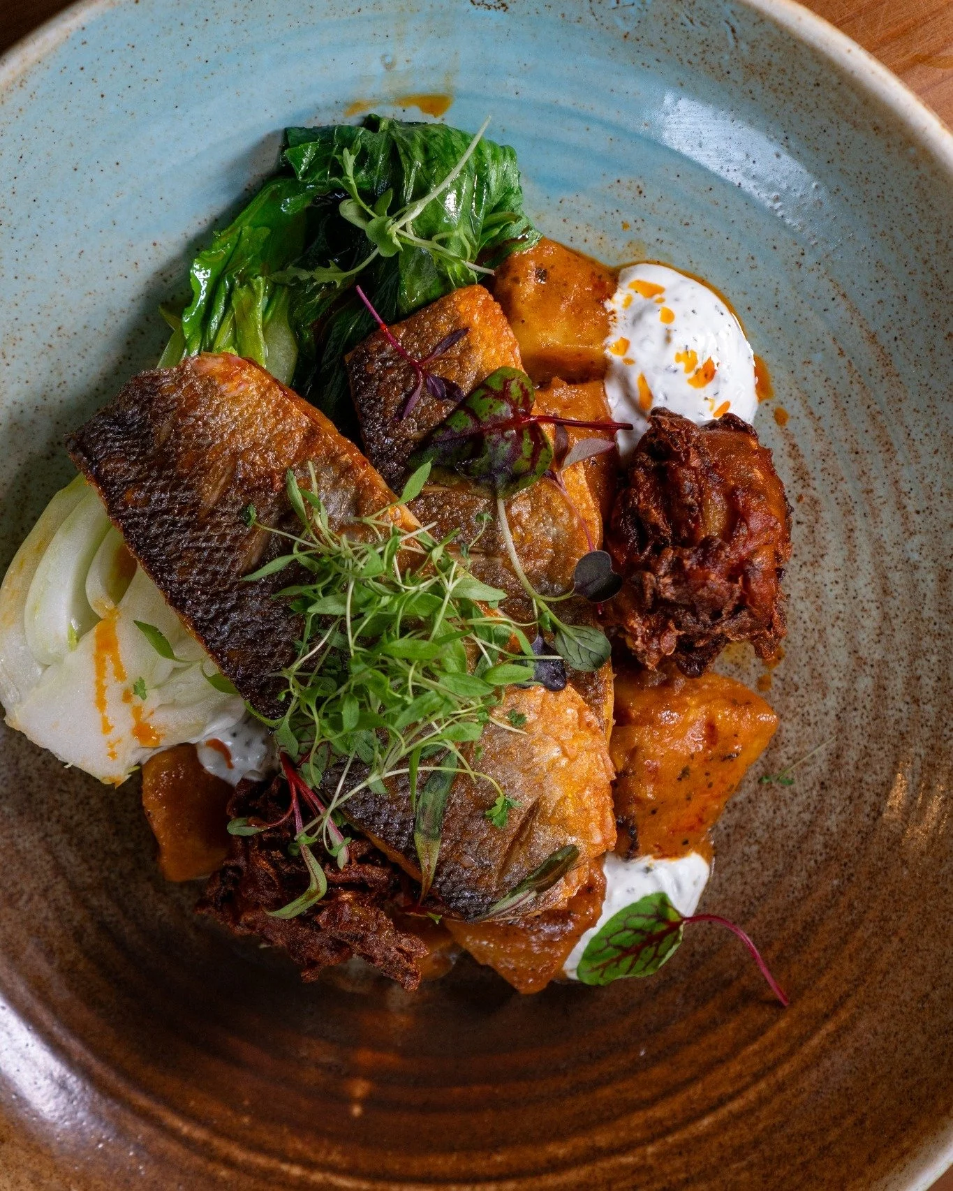 A twist on a classic 😋

Tikka Masala Seabass, served with Bombay potatoes, pak choi, fennel and onion bhaji, finished with mint yoghurt and charred lime.

Available Monday to Saturday 12pm to 9:30pm.

Book table via link in bio 🔗

 #nefoodies #newc