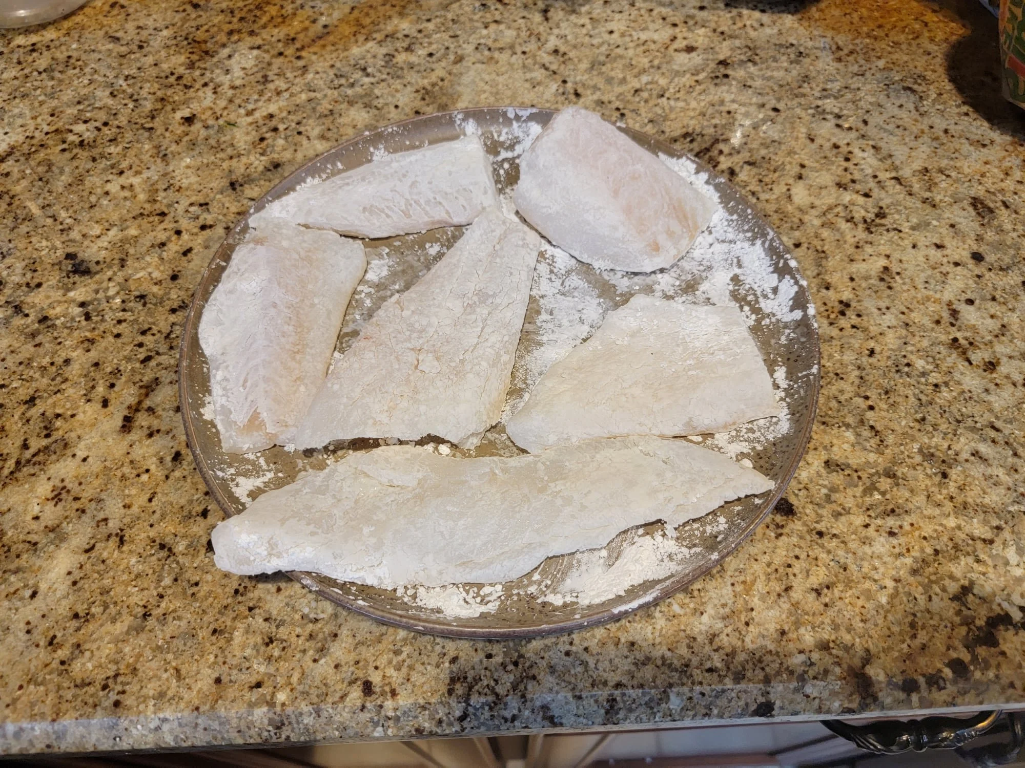 Fish in corn starch.jpeg