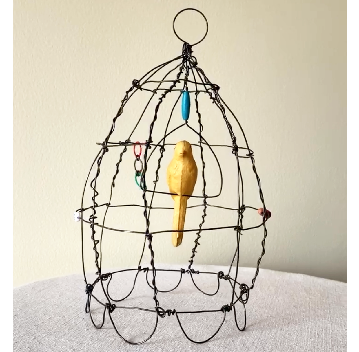 Yellow Bird in Cage (In Motion)