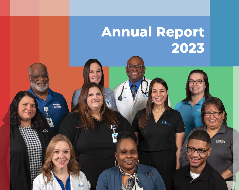 Group of ten healthcare professionals, including doctors and nurses, posing together for a photo on the cover of an annual report titled '2023' with colorful backgrounds.