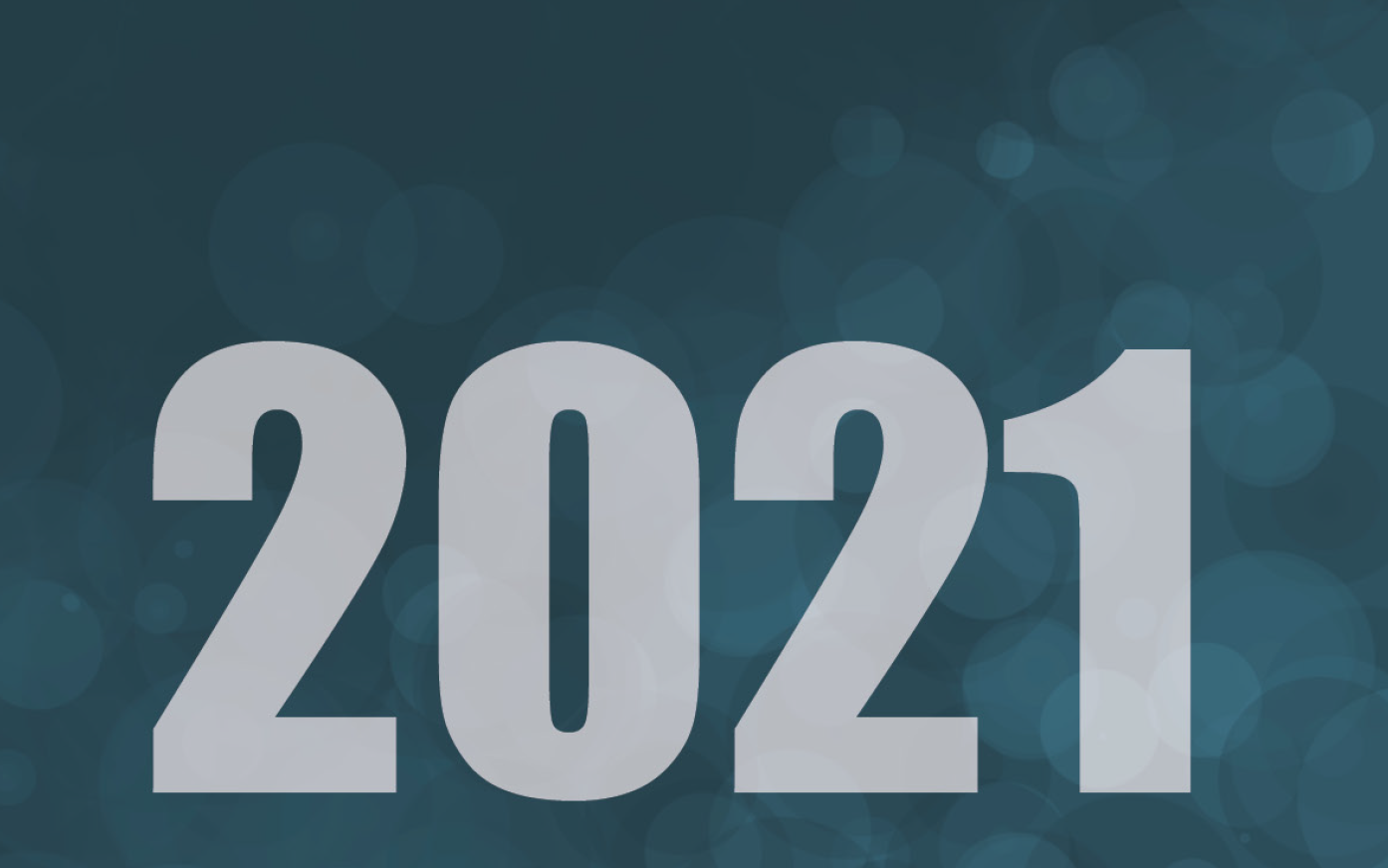 The image displays the year 2021 with a dark blue background and bokeh light effects.