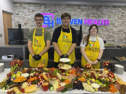 LaVille students pitch in and practice catering skills at Plymouth Bowen Health opening