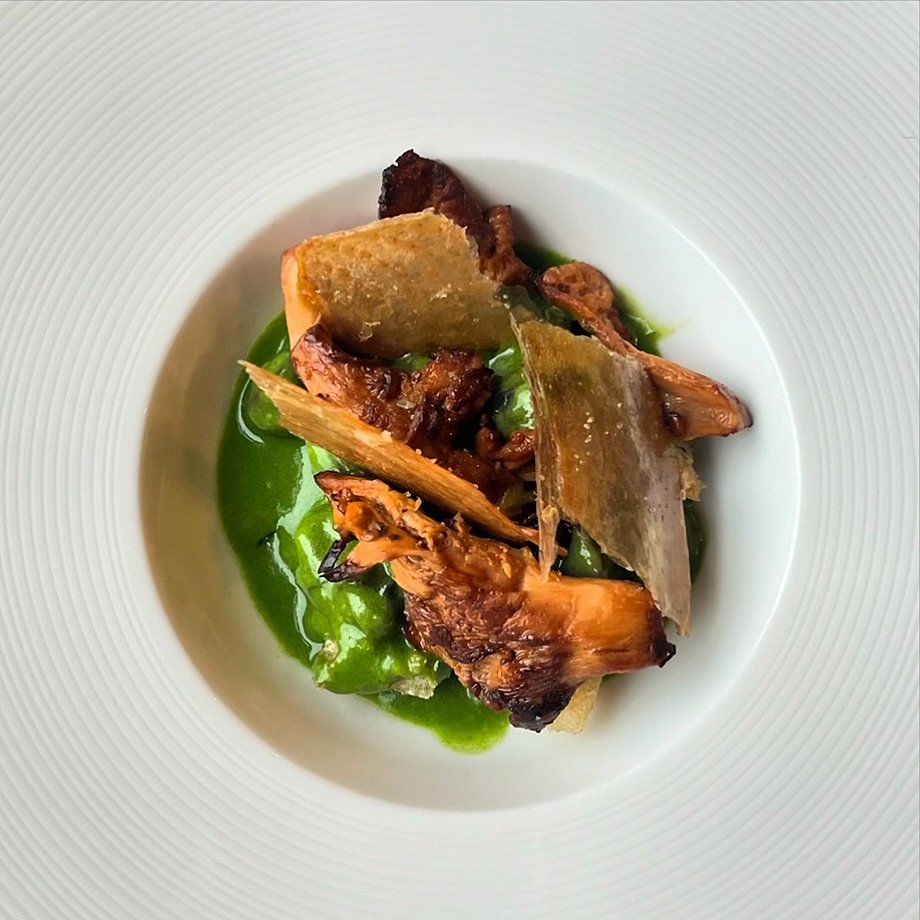 Escargot with garlic butter, parsley, chanterelles, croutons and chicken skin. #justsayoui 

#escargot #burgundysnails #frenchbistro #frenchcuisine #stleats #foodstagram #theartofplating