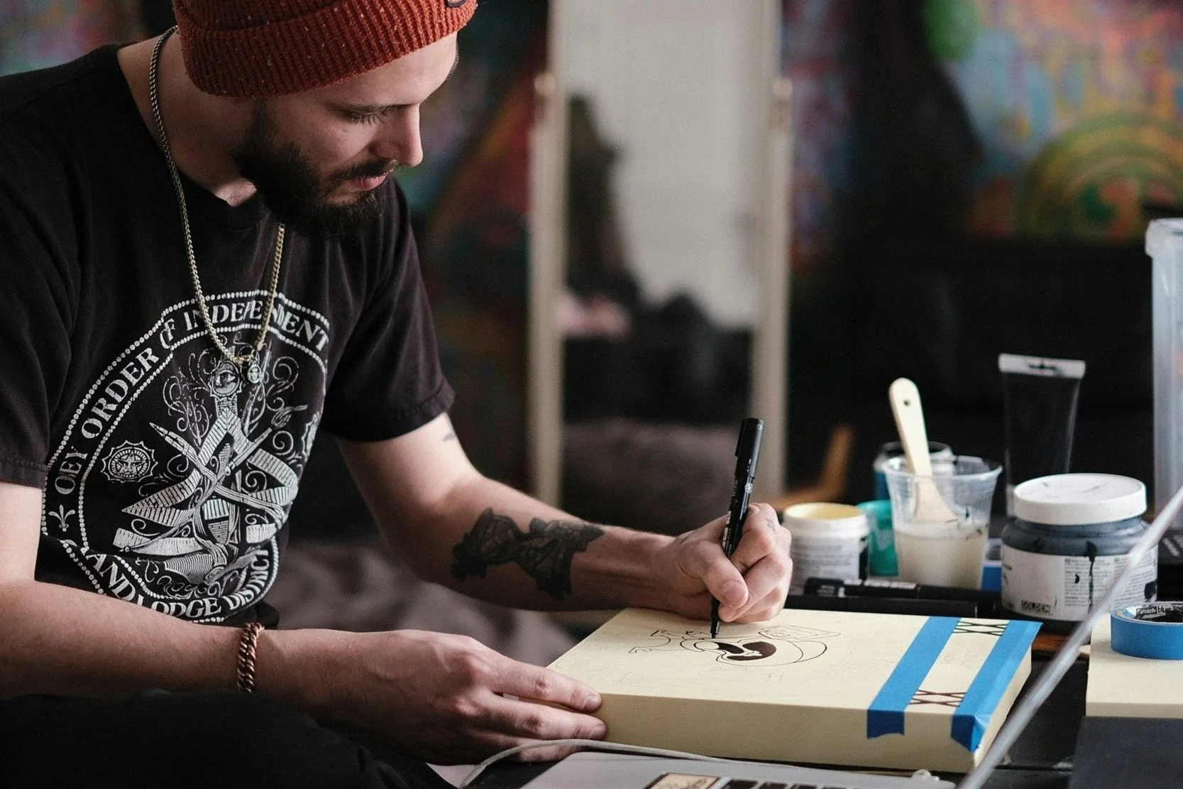 Artist painting on a canvas