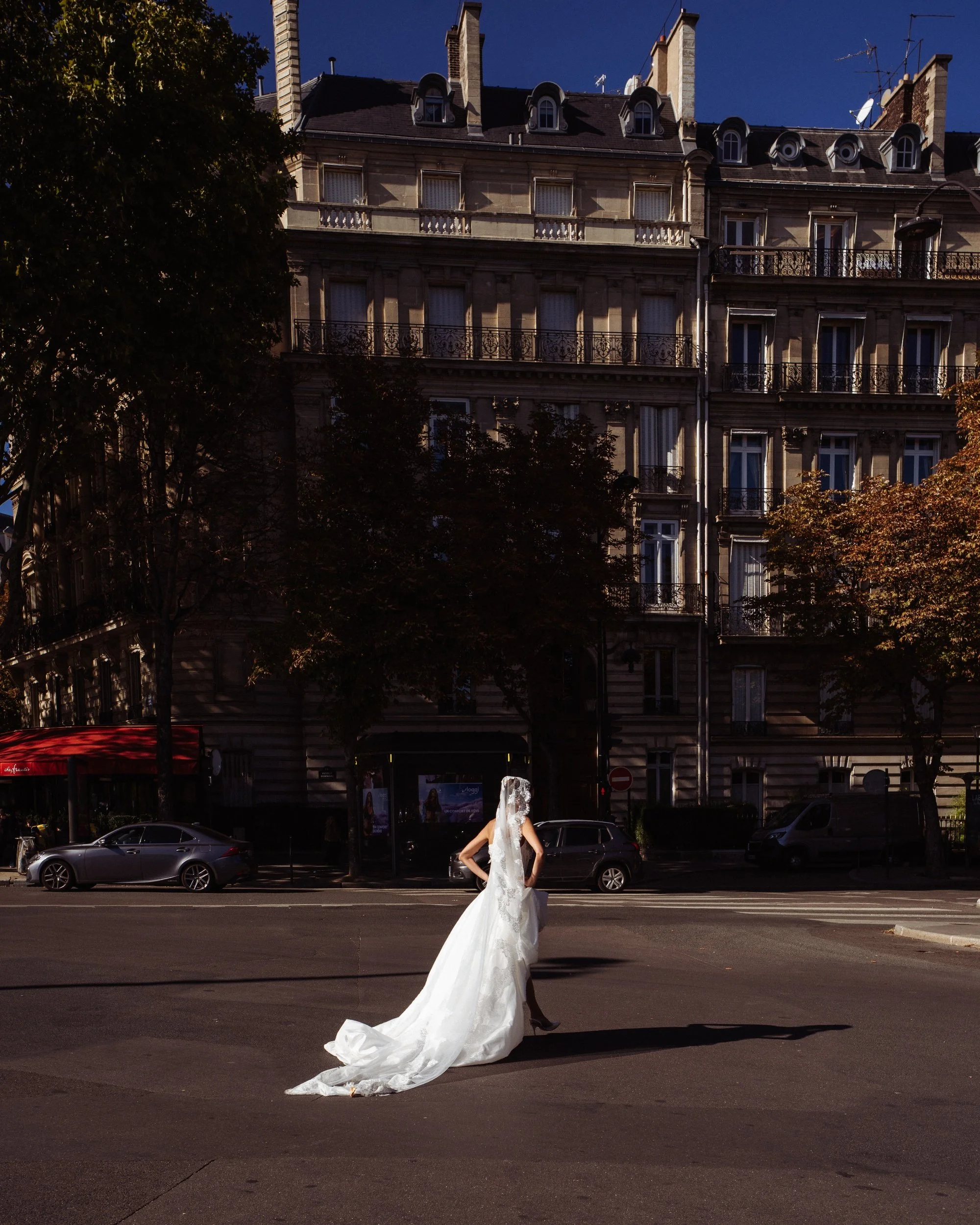 woman in bridal wear on a road in paris