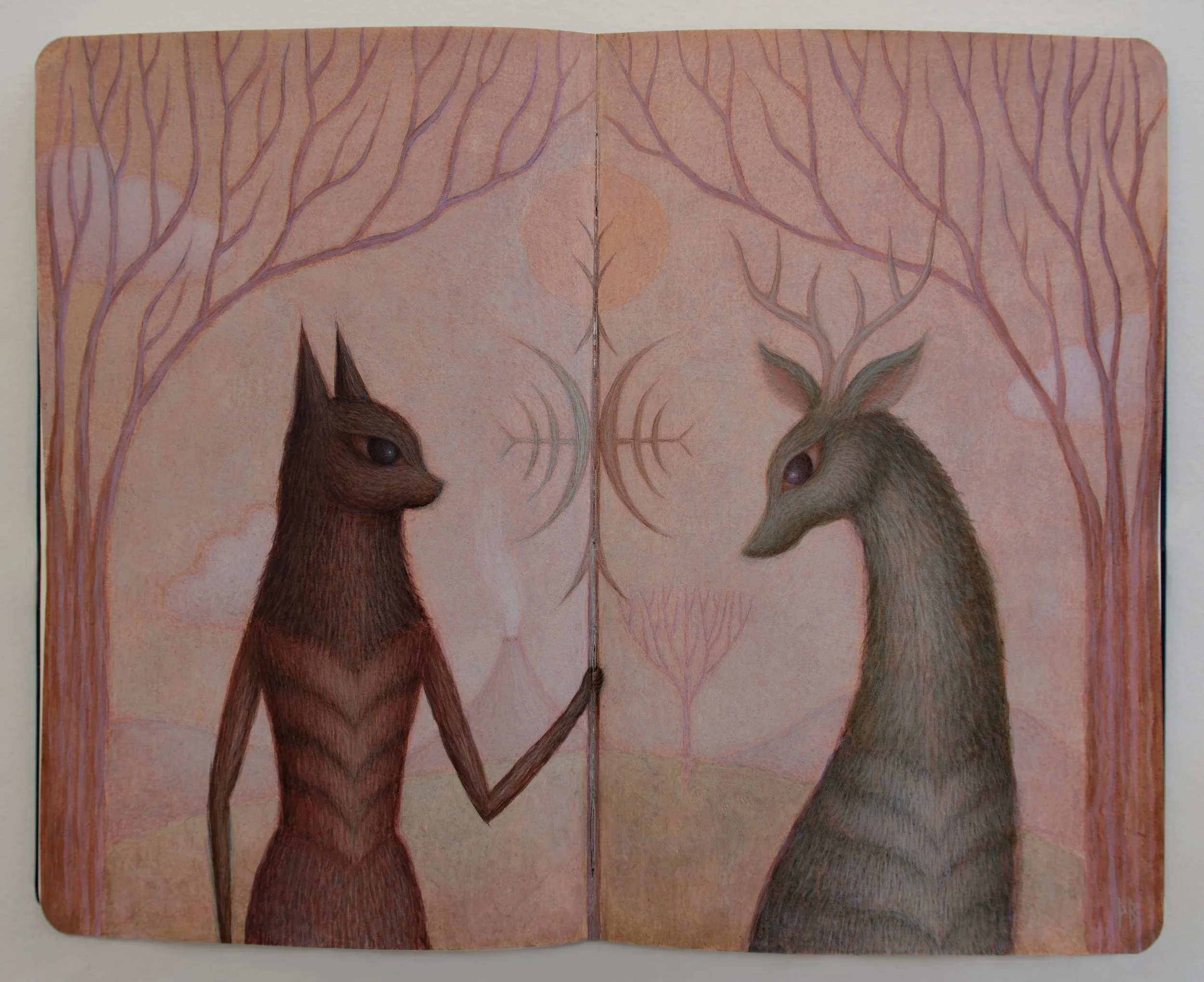 anthropomorphic cat and deer looking at each other across 2 sides of a Moleskine sketchbook