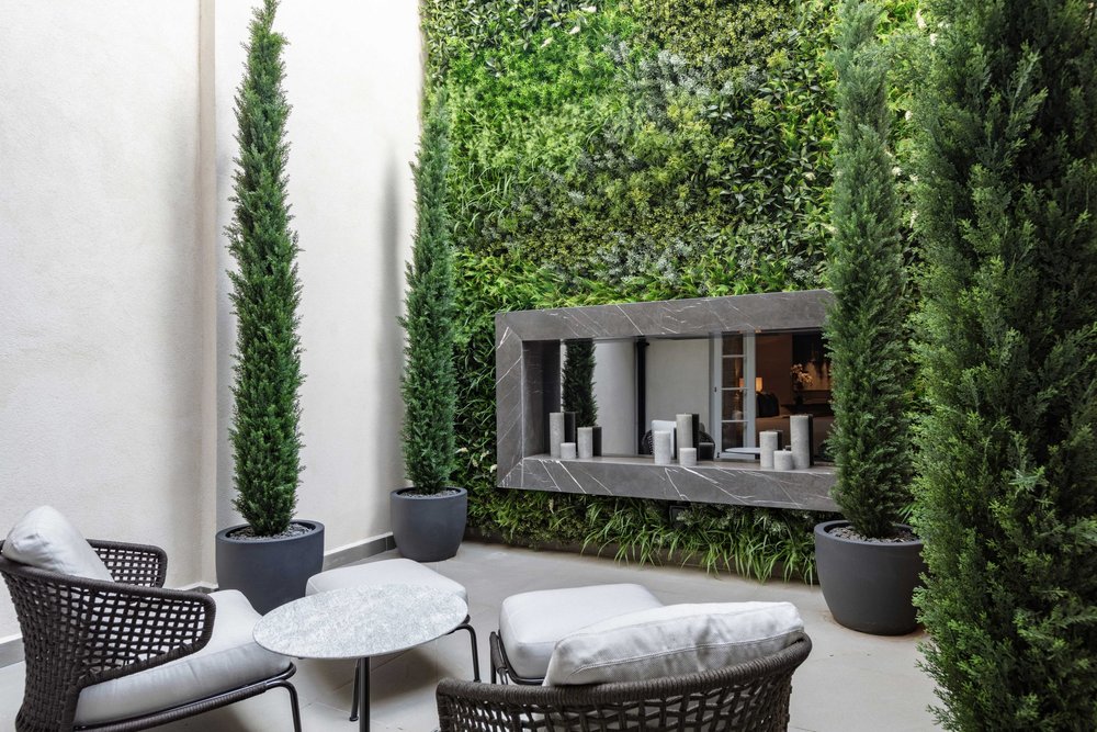 construction company london in delivering this beautiful enclave garden at 20-22 eaton place