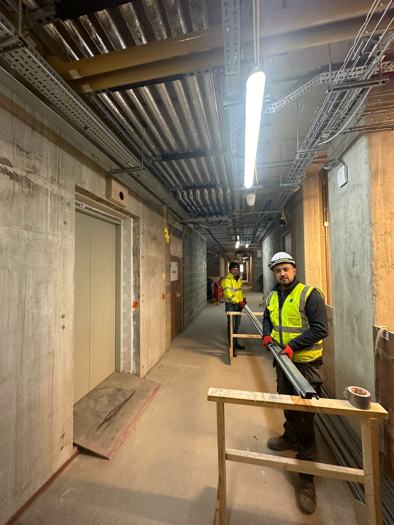 Ant Yapi workmen working on the fitout at building 8 at the Chelsea Barracks project