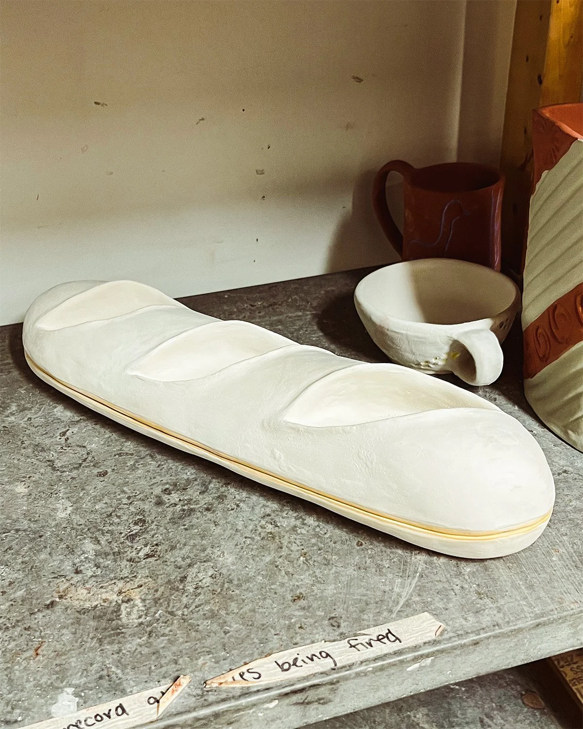 Sculpted baguette dish by Lauren Hom.