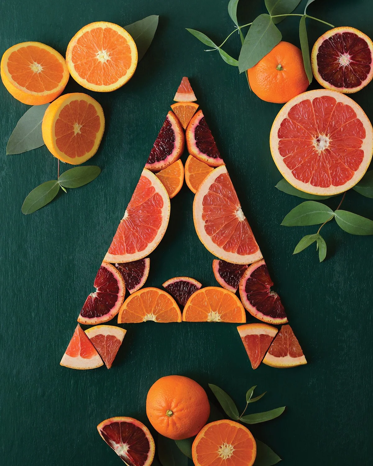 Letter "A" made of citrus by Lauren Hom for Afar Magazine's Winter 2026 issue.