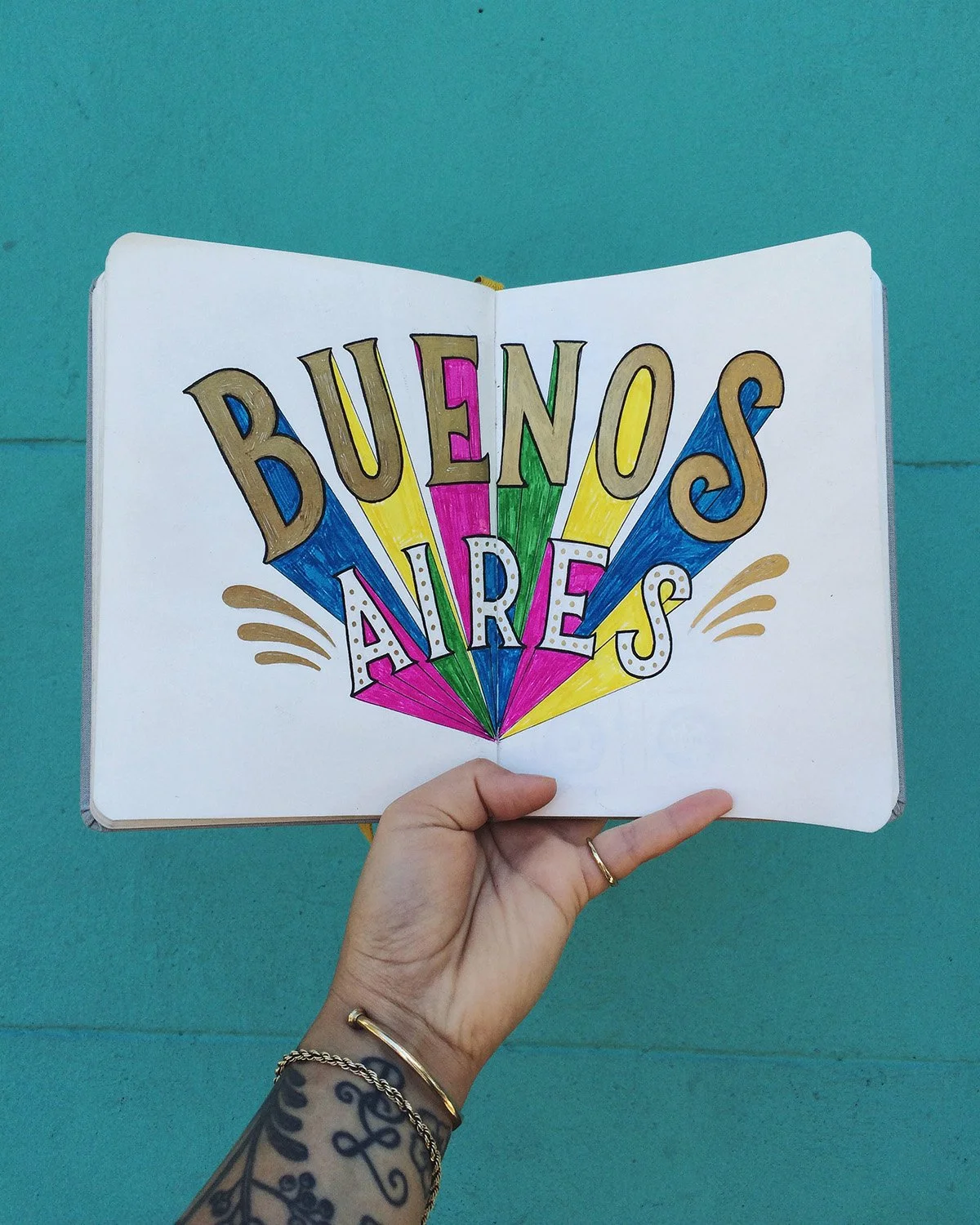 Colorful sketchbook spread reading "Buenos Aires."